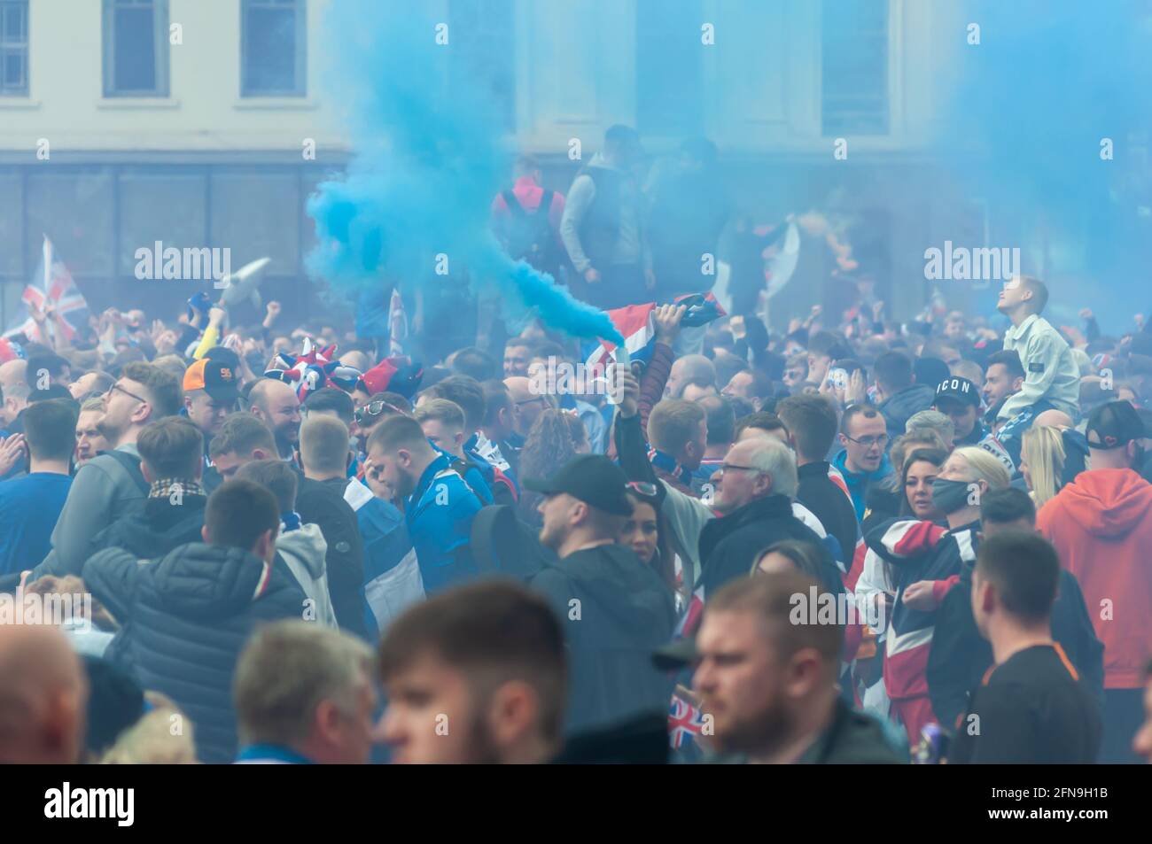 Glasgow, Scotland, UK. 15th May, 2021. Rangers fans celebrate  winning the Scottish Premiership title. Credit: Skully/Alamy Live News Stock Photo