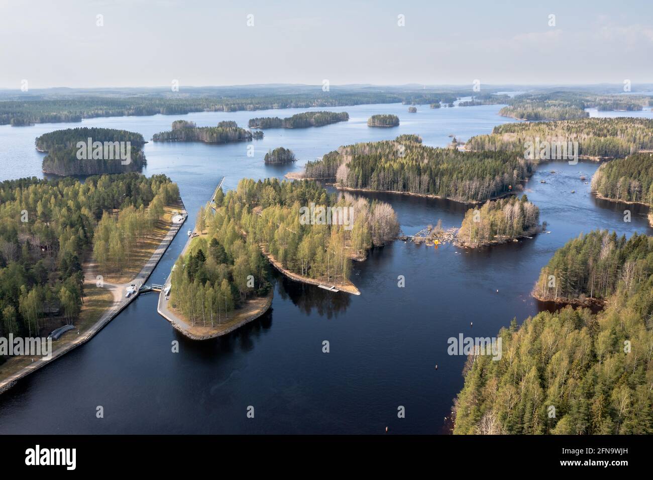 Three canals of different ages in the lake area of Eastern Finland. One of the canals is now regulated and one for museum use, newest for traffic use. Stock Photo