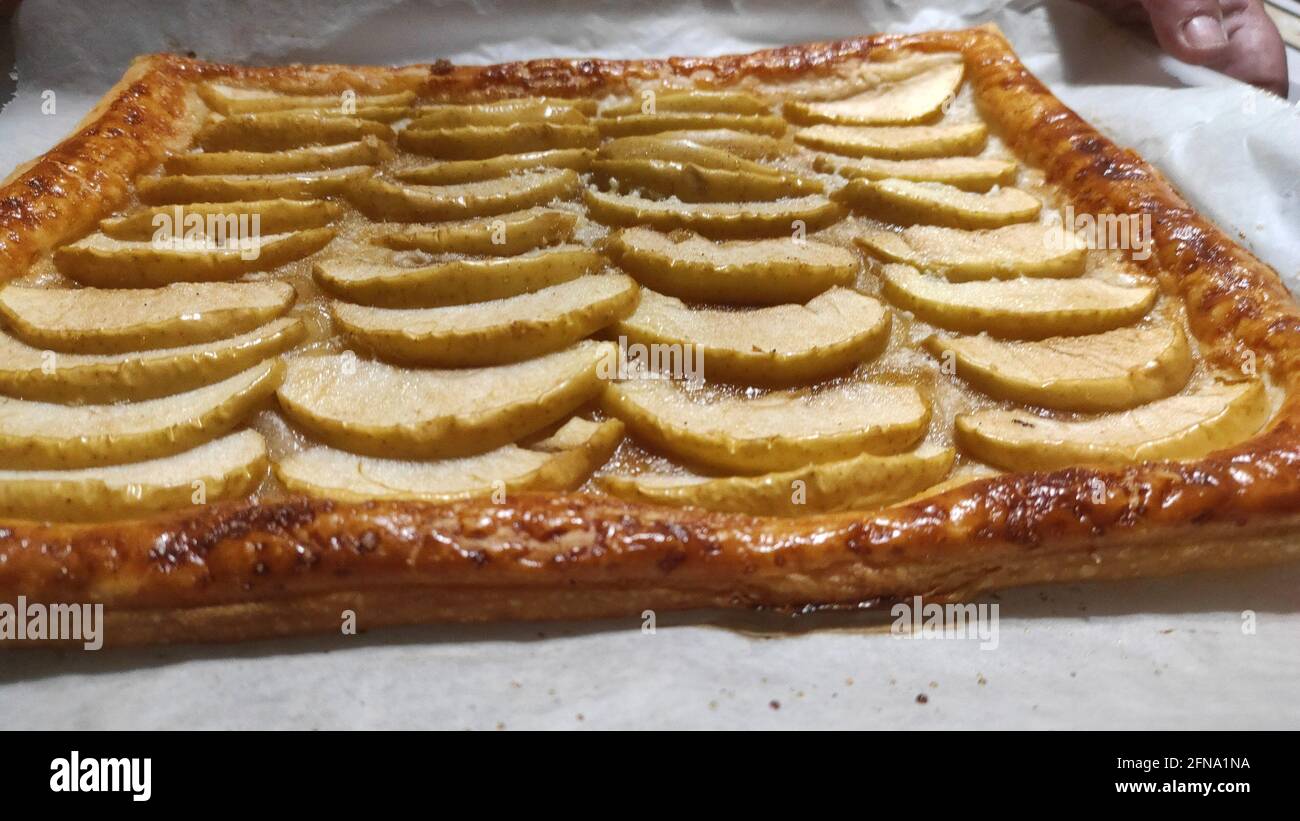apples cut into strips make a delicious dessert they are a puff pastry Stock Photo