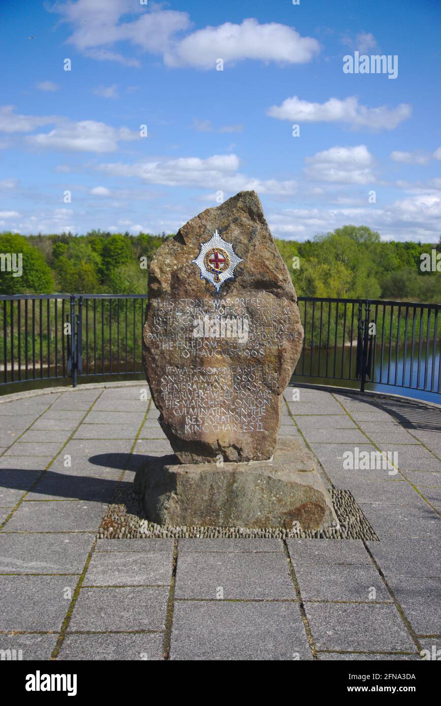 Stone monument celebrating the tercentenary of the Coldstream Guards at the River Tweed viewpoint in Henderson Park, Coldstream, Scottish Borders, UK. Stock Photo