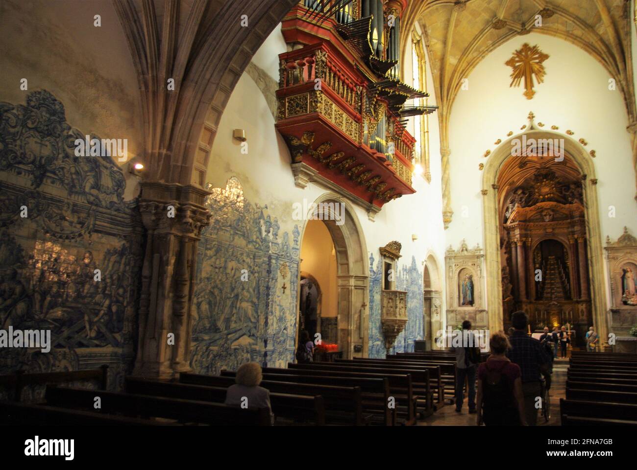 Beautiful interior with 18th century Baroque pipe organ, and ceramic tiling, Santa Cruz Monastery, Coimbra, Portugal Stock Photo