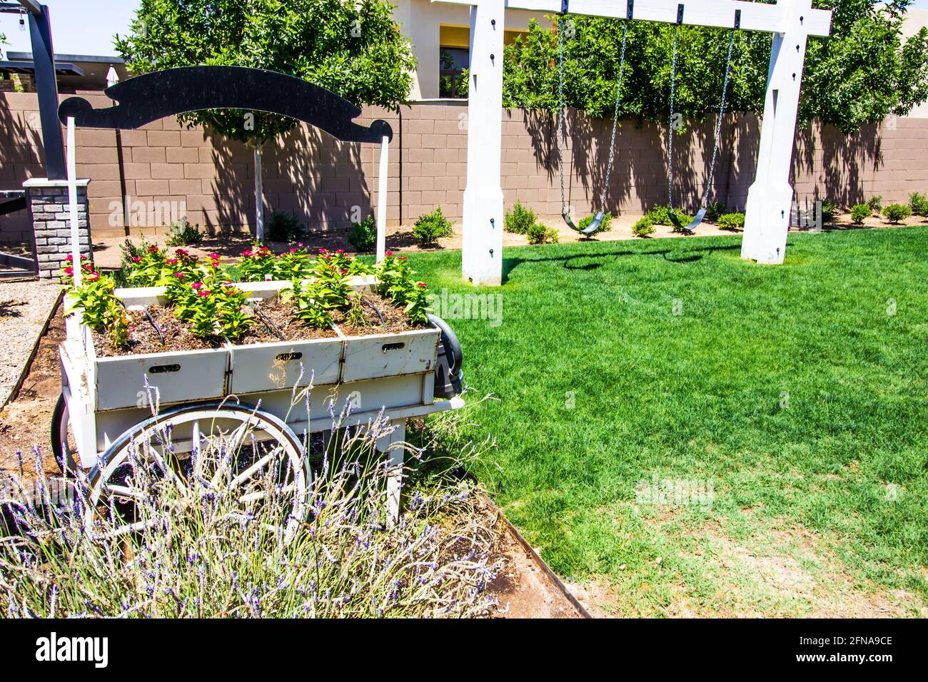 Old Weathered Flower Cart In Rear Yard With Swings Stock Photo Alamy