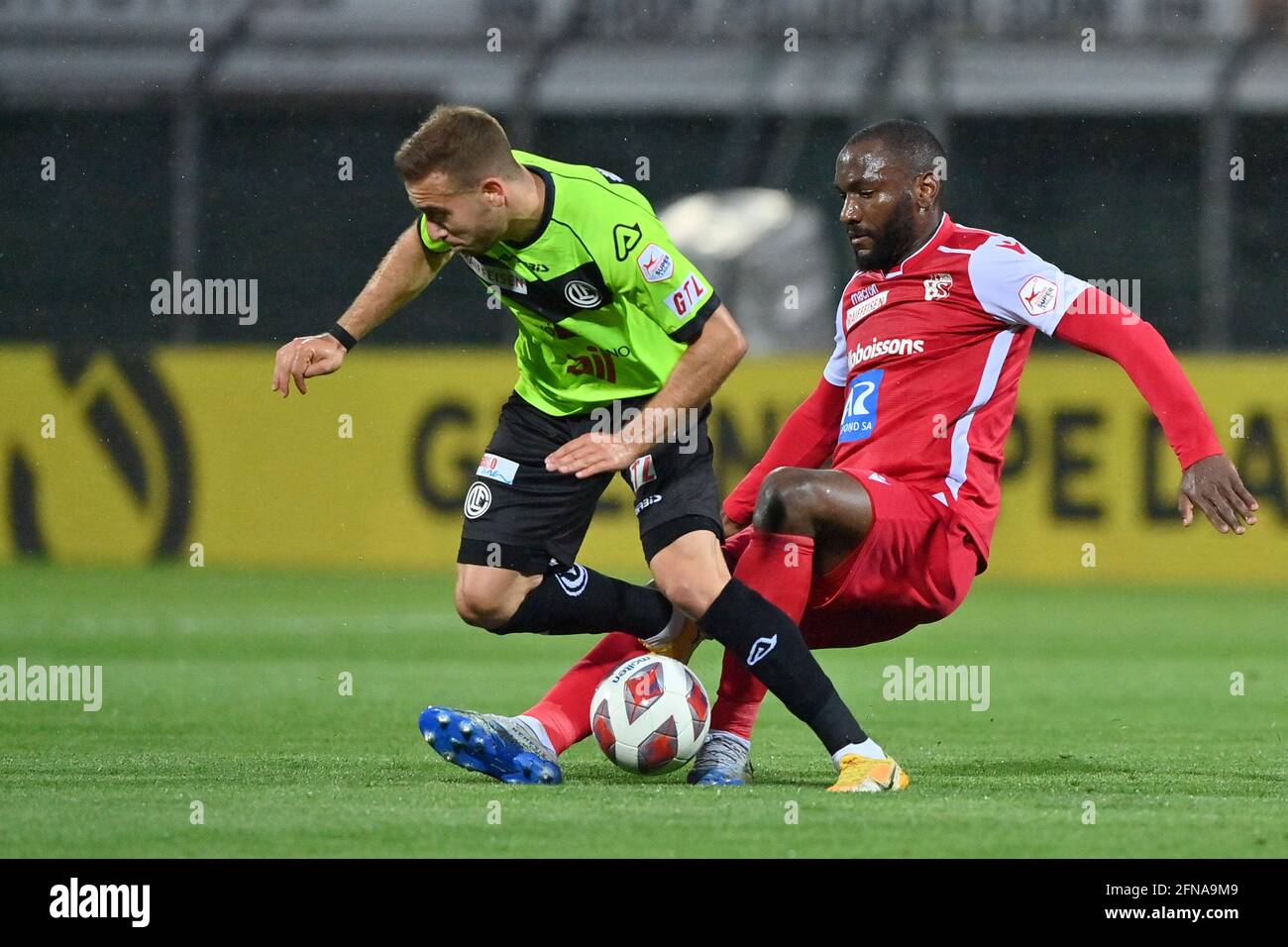 Lugano, Switzerland. 25th July, 2021. Antonio Marchesano (#10 FC Zuerich)  and Sandi Lovric (#24 FC Lugano) during the Super League match between FC  Lugano and FC Zuerich at Cornaredo Stadium in Lugano