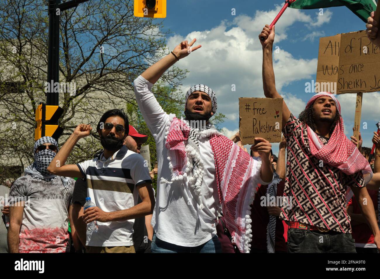 Ottawa, Canada. May 15th, 2021. On the Nakba day, commemorating the 1948 Palestinian forced Exodus from Palestinian territories, thousands of protesters gather and march through the street of Ottawa to demand that Palestine be freed from Israel occupation. The also denounce the increase of violence from the Israeli army over the last week, and demand that the Canadian government speak up about the attacks of Palestinians in Gaza, Jerusalem, West bank and all of Palestine. Credit: meanderingemu/Alamy Live News Stock Photo