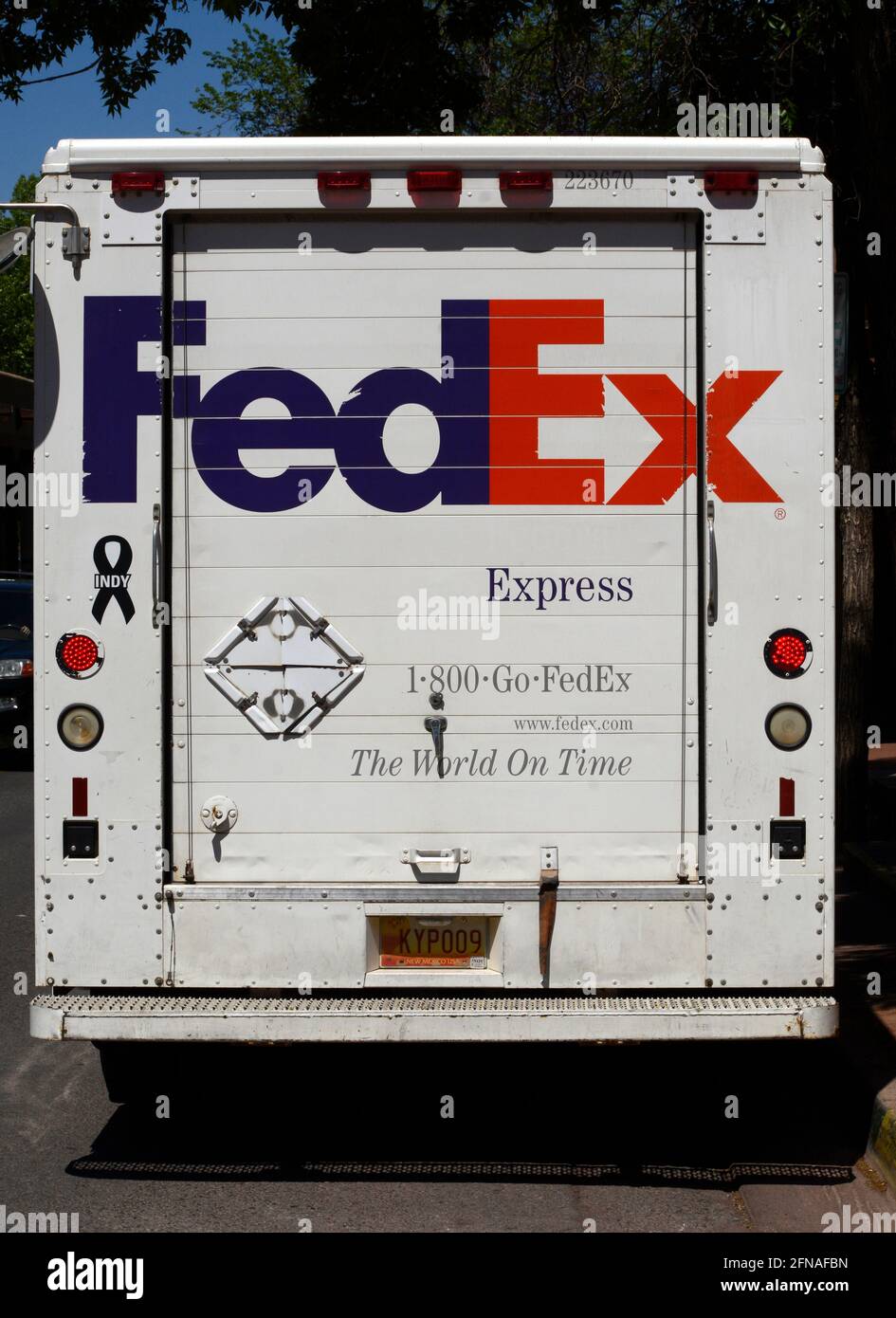 A FedEx (Federal Express) truck makes deliveries in Santa Fe, New Mexico. Stock Photo