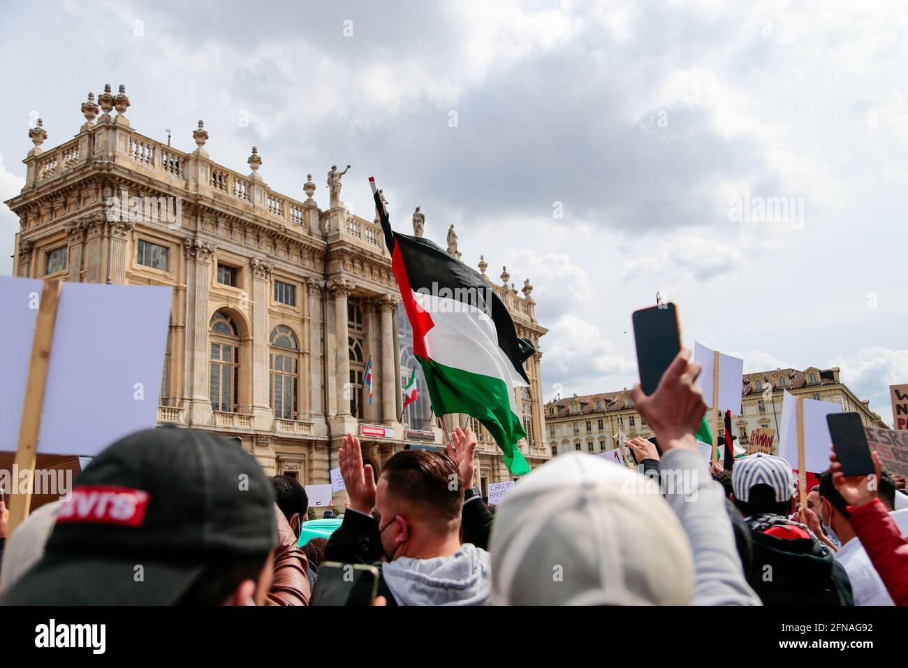 Torino/Italy, 15 May 2021,  According to the police 5000 people joined the peace full sit-in (R)Esistiamo- FreePalestine to say stop the violence and ask the end of the Israeli slaughter to the Palestinian civil population. In the last weeks the Israeli attack has been more aggressive. Till today 33 children were killed and more than 2000 houses were destroyed.  Photo Nderim KACELI/Alamy Live News Stock Photo