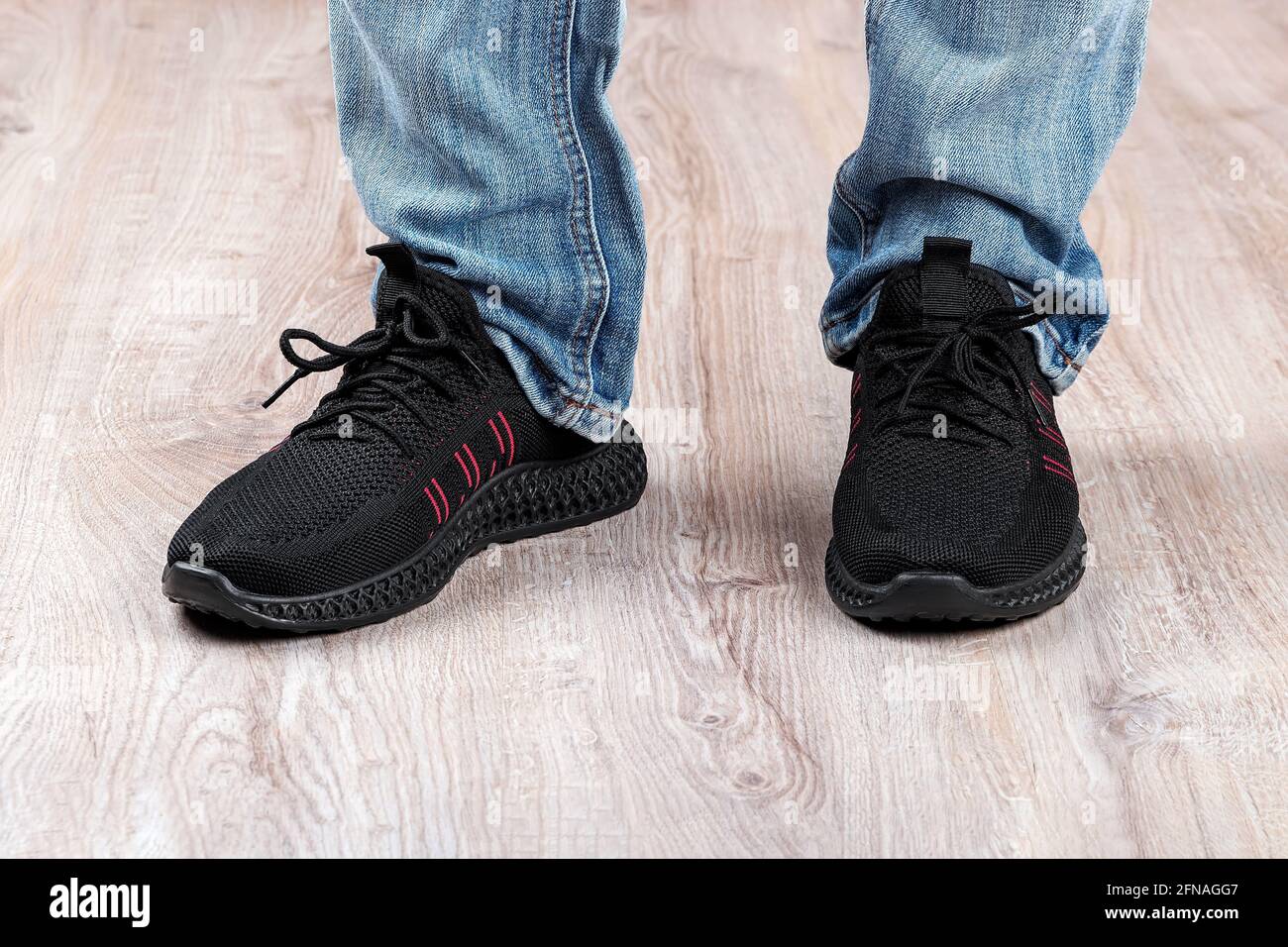 Black shoes and blue jeans hi-res stock photography and images - Alamy