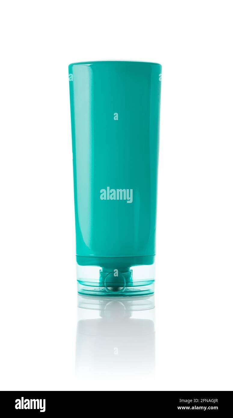 Turquoise plastic bottle of hair conditioner or body cream isolated on white background