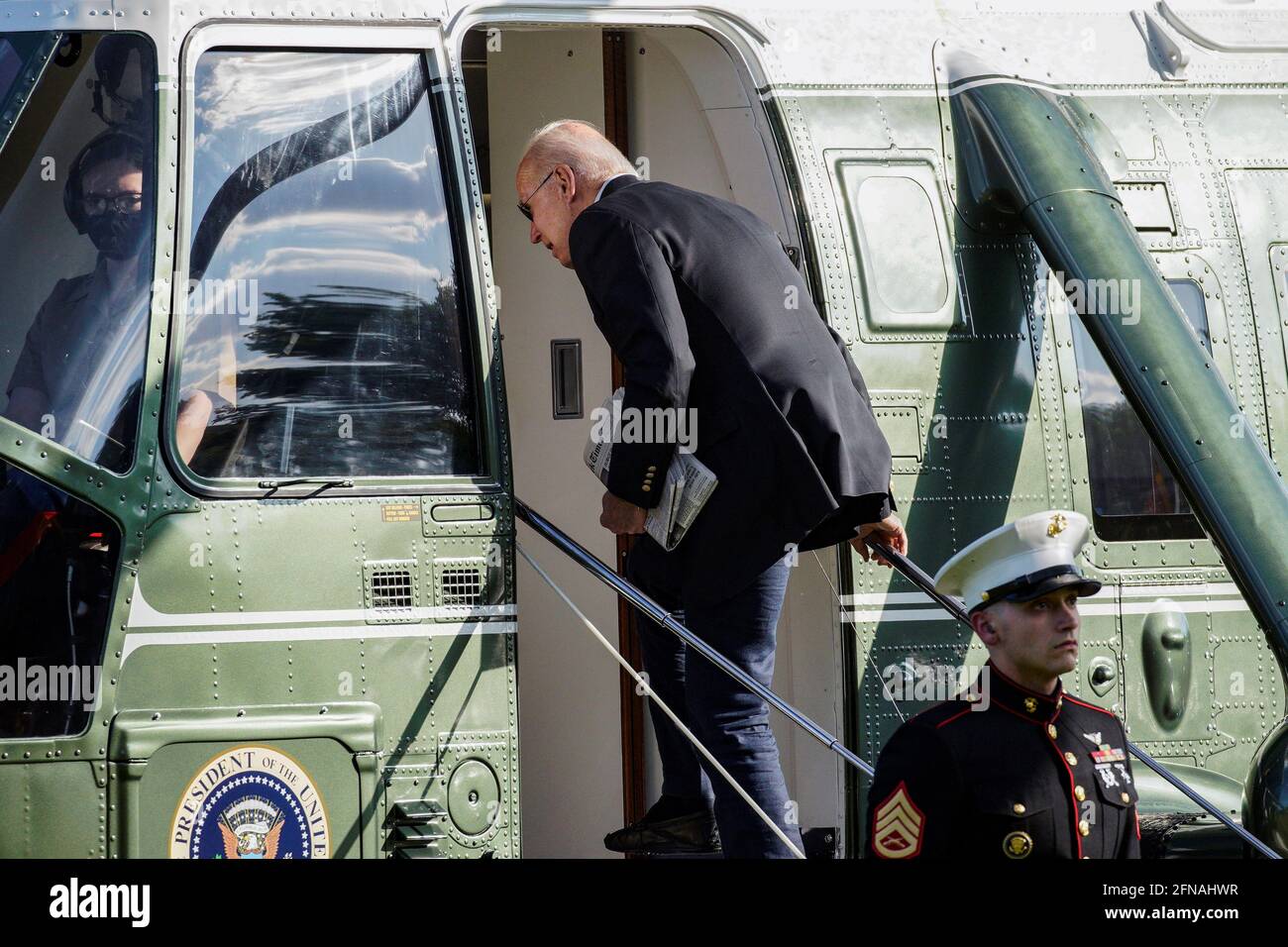U.S. President Joe Biden boards Marine One as he departs the White House en route to Wilmington, Delaware from the Ellipse in Washington, U.S., May 15, 2021. REUTERS/Yuri Gripas Stock Photo