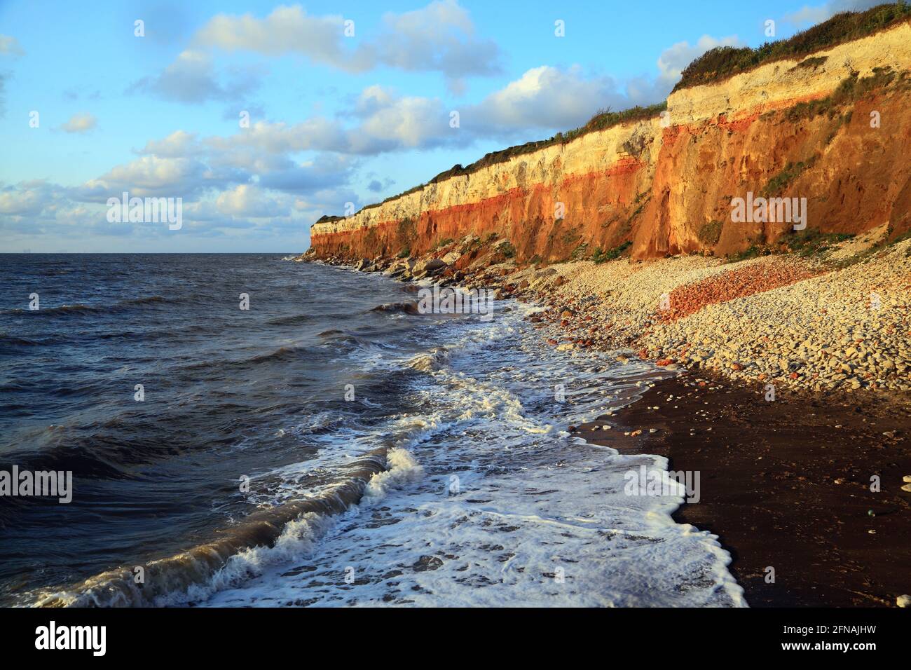 Hunstanton Cliffs, striped pattern, stripes, waves, high tide,  surf, The Wash, North Sea, Norfolk, England, UK Stock Photo