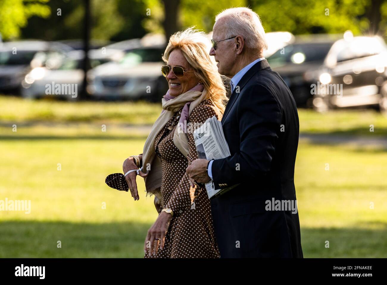 Washington, United States. 15th May, 2021. U.S. President Joe Biden and First Lady Jill Biden walk to Marine One on the Ellipse near the White House in Washington, DC, U.S., on Saturday, May 15, 2021. Biden rescinded several executive actions on Friday that were put in place by Donald Trump, including one targeting social media companies that his predecessor had ordered after Twitter fact-checked his tweets. Photographer: Samuel Corum/Pool/Sipa USA Credit: Sipa USA/Alamy Live News Stock Photo