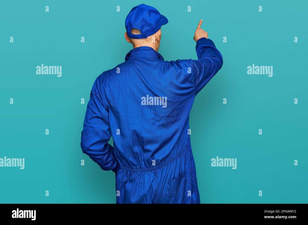 Rear view bald man wearing hi-res stock photography and images - Alamy