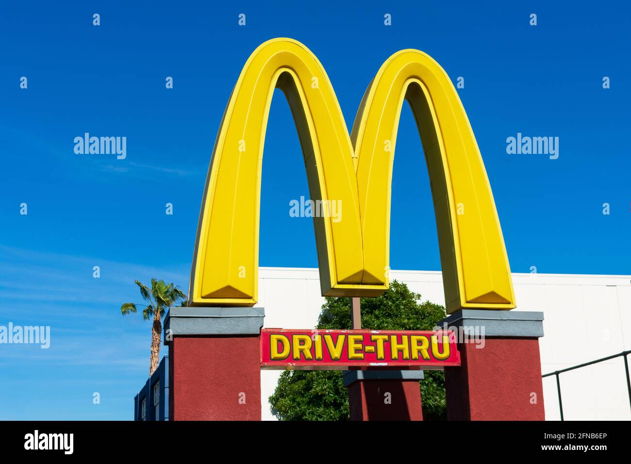 McDonald's Golden Arches symbol. Drive thru sign at fast food chain ...