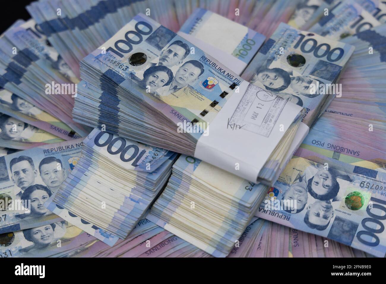 A Pile Of One Thousand Philippines Banknotes. Cash Of Thousand