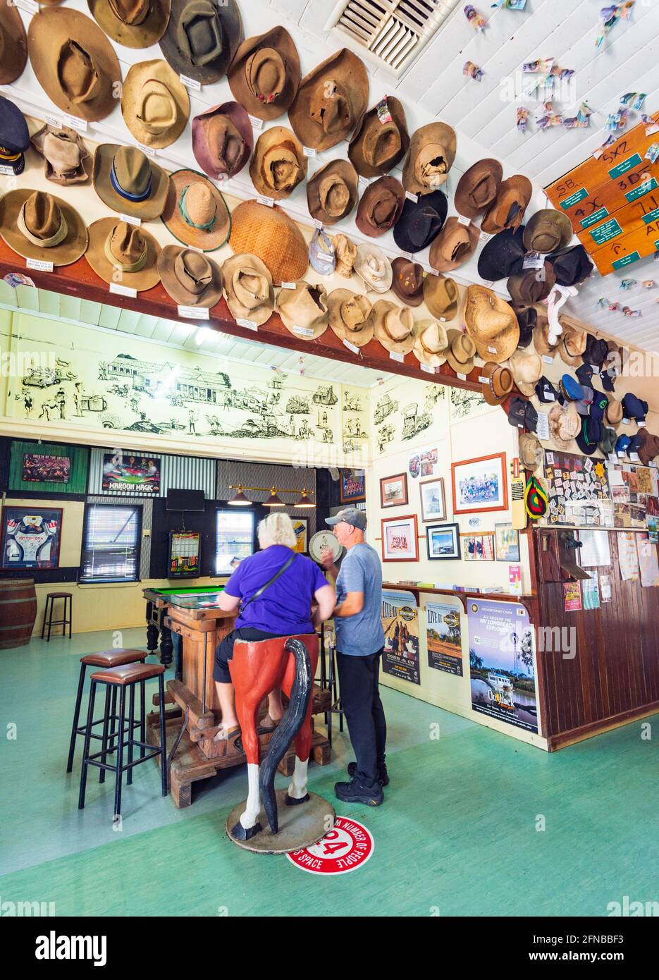 People sitting on bar stools hi-res stock photography and images - Alamy