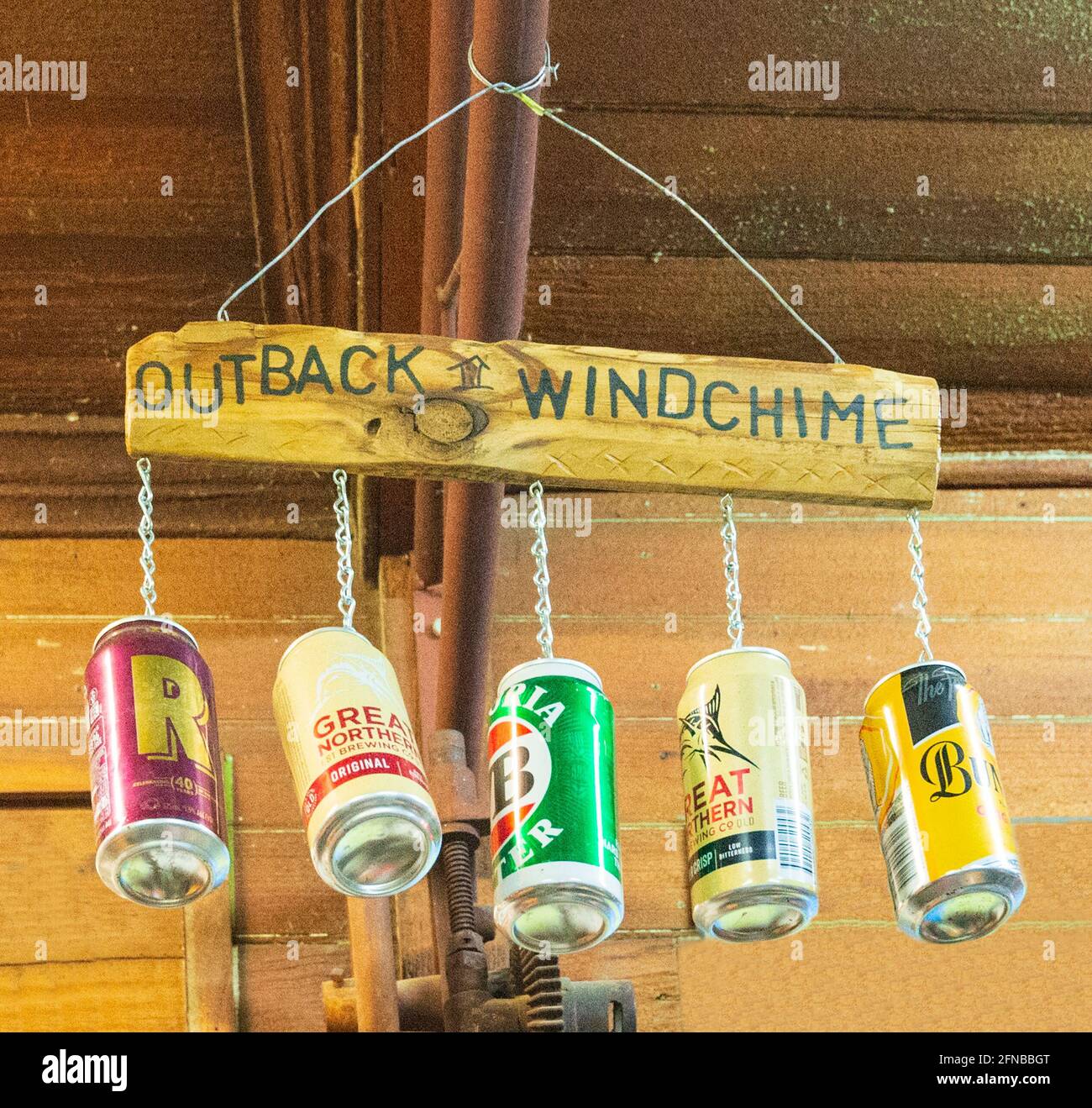 Amusing Outback windchime made of beer cans inside the Walkabout Creek Hotel featured in the Crocodile Dundee's movie, Central Queensland, QLD, Austra Stock Photo