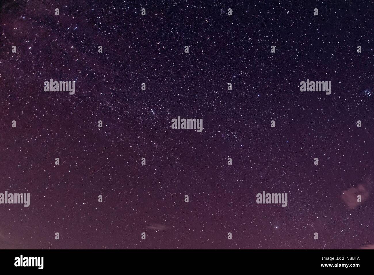Purple night sky full of stars as background Stock Photo - Alamy