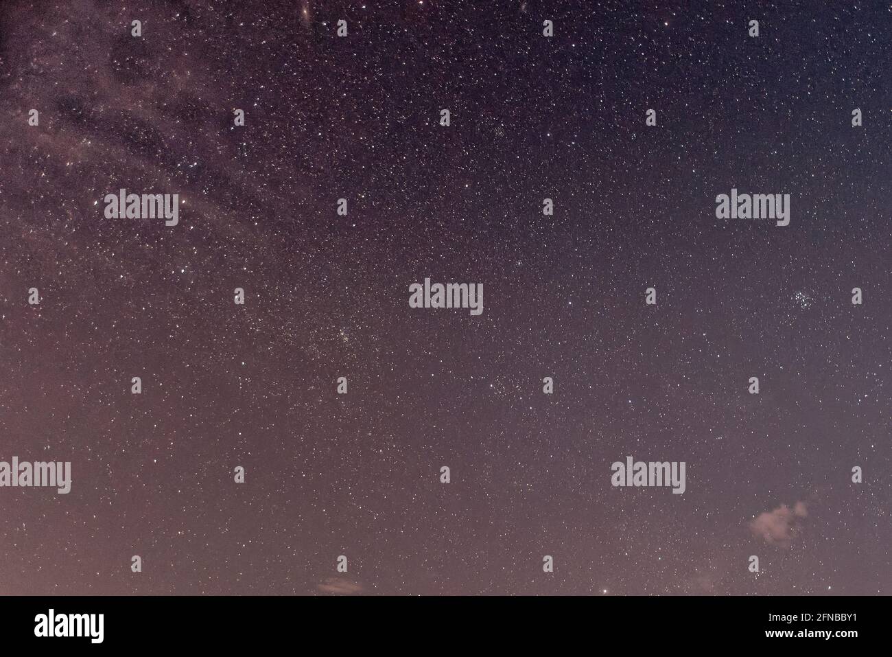 Purple night sky full of stars as background Stock Photo - Alamy