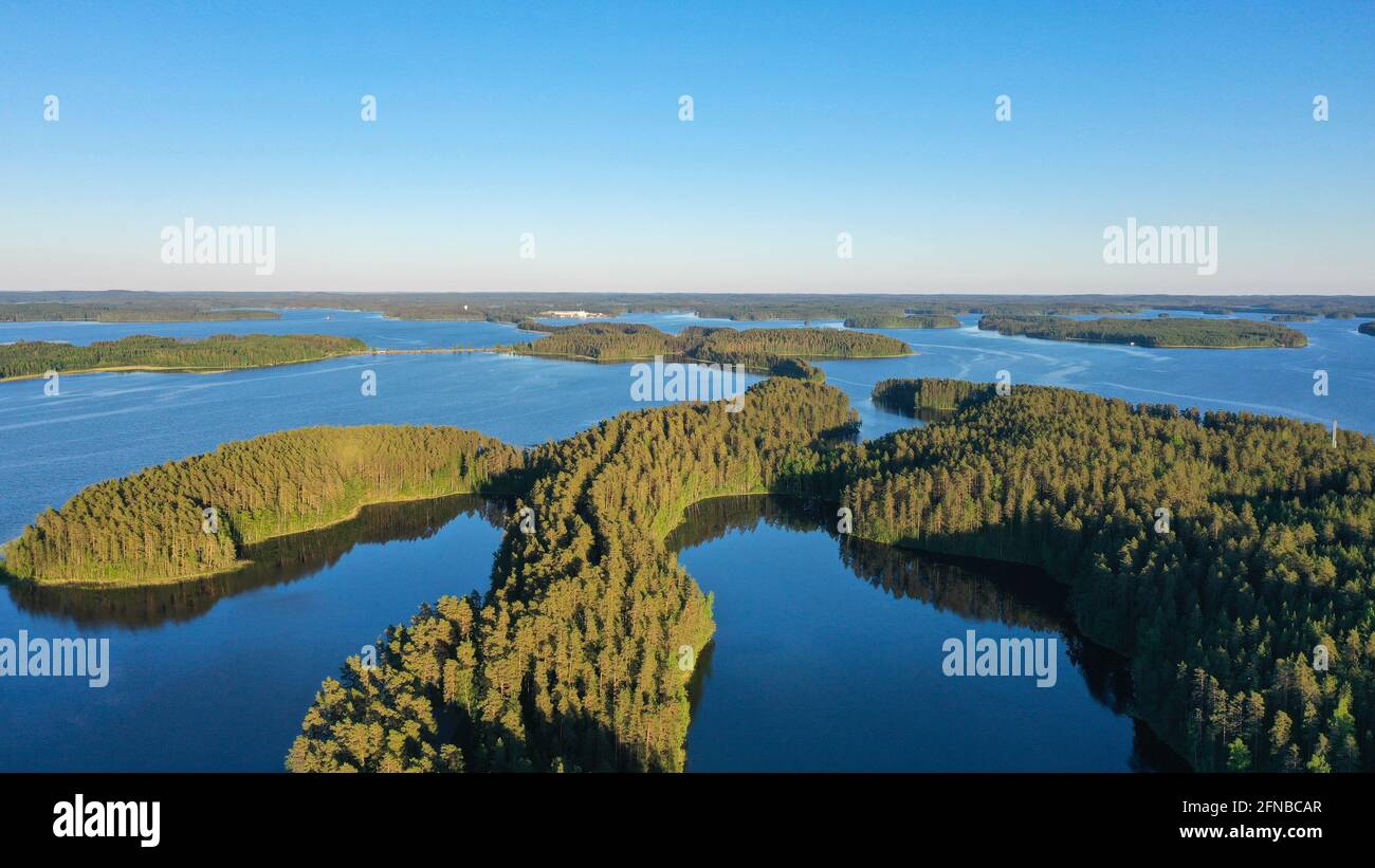 Aerial summer view of famous Punkaharju ridge in Eastern Finland in early summer with light green leaves. Stock Photo