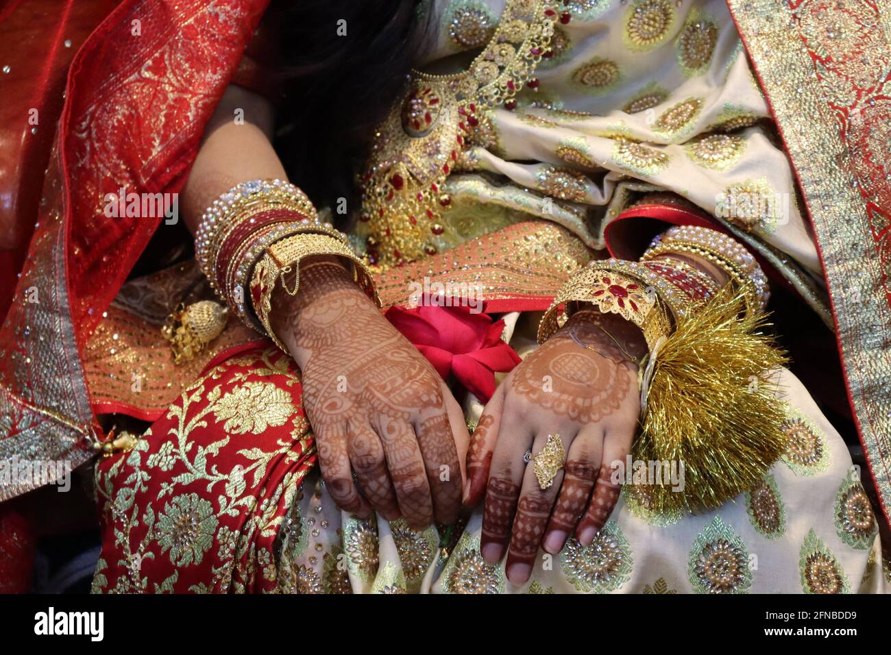 a Bangladeshi bride closeup with wedding ring in finger Stock Photo