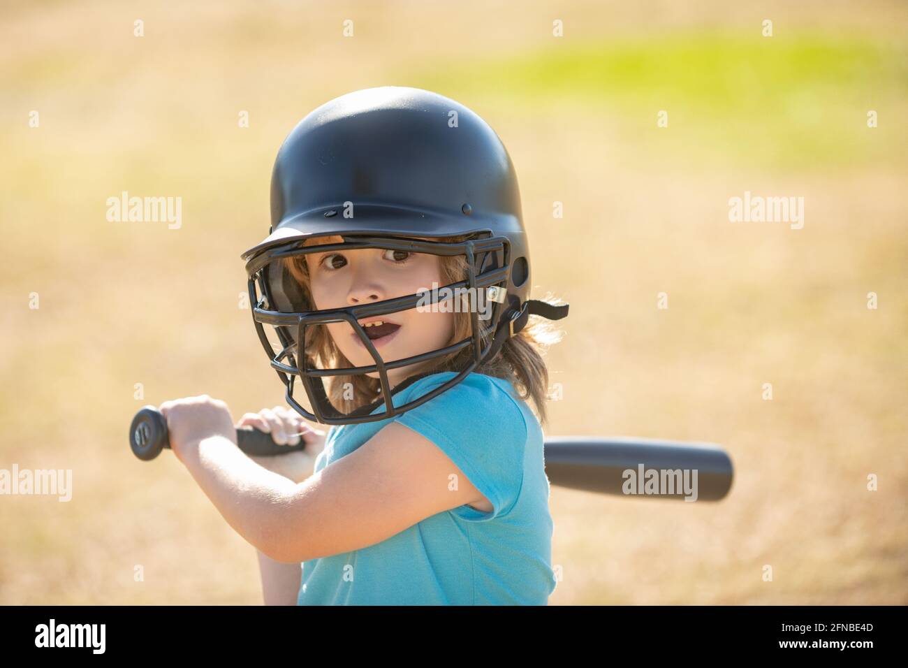 Baseball players kid swinging the bat at a fastball from the pitcher Stock Photo Alamy
