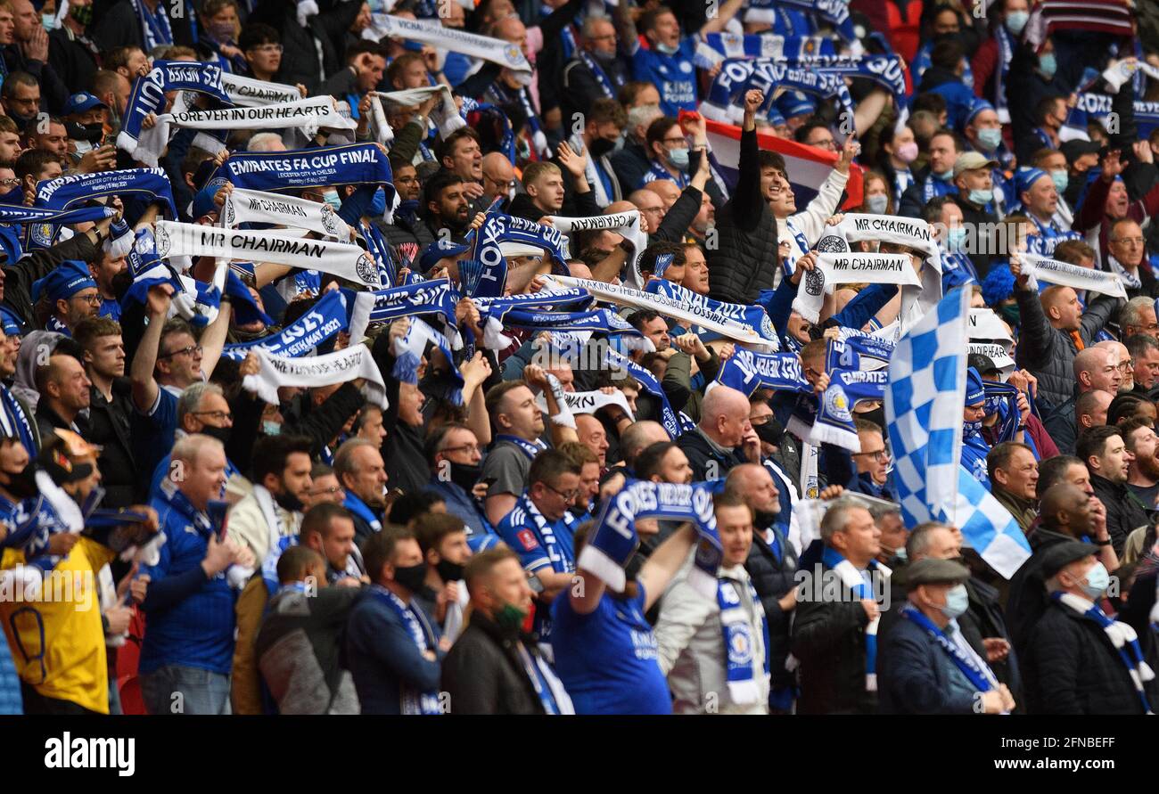 London, UK. 15th May, 2021. Leicester City fans salute Chairman Aiyawatt Srivaddhanaprabha during the FA Cup Final against Chelsea. Picture Credit : Credit: Mark Pain/Alamy Live News Stock Photo