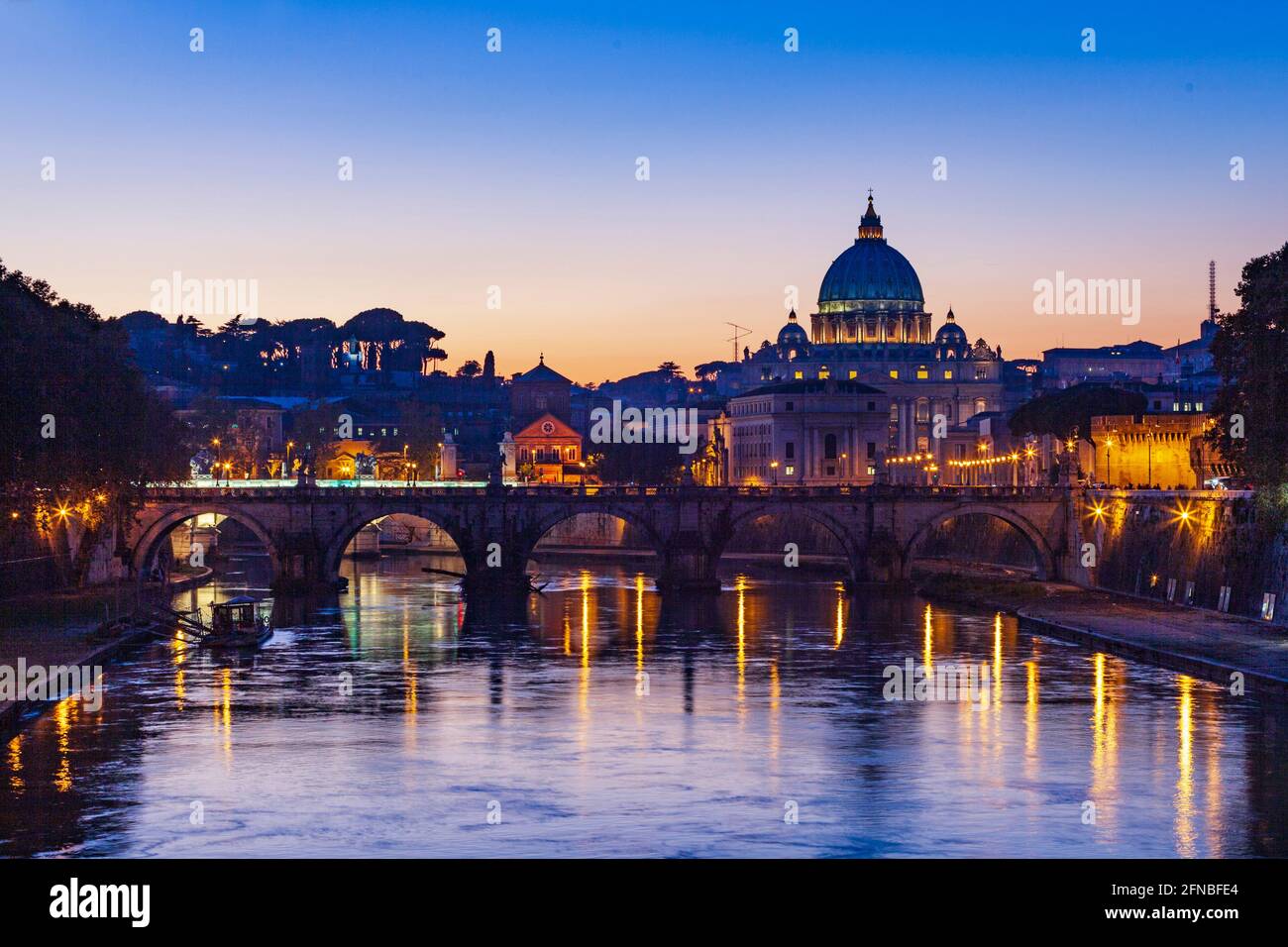 View of St Peter's Basilica and the Vatican at dusk, Rome, Lazio, Italy Stock Photo
