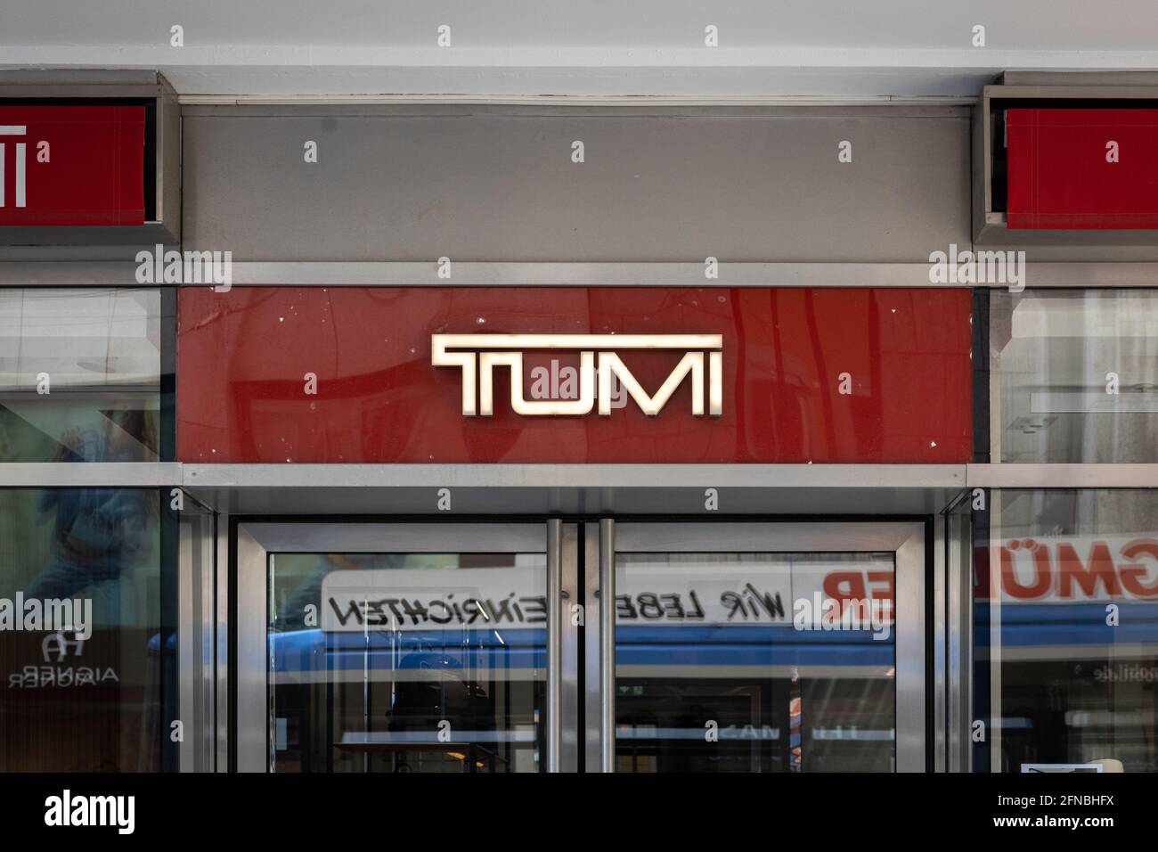 Tumi store sign in Munich town center Stock Photo - Alamy
