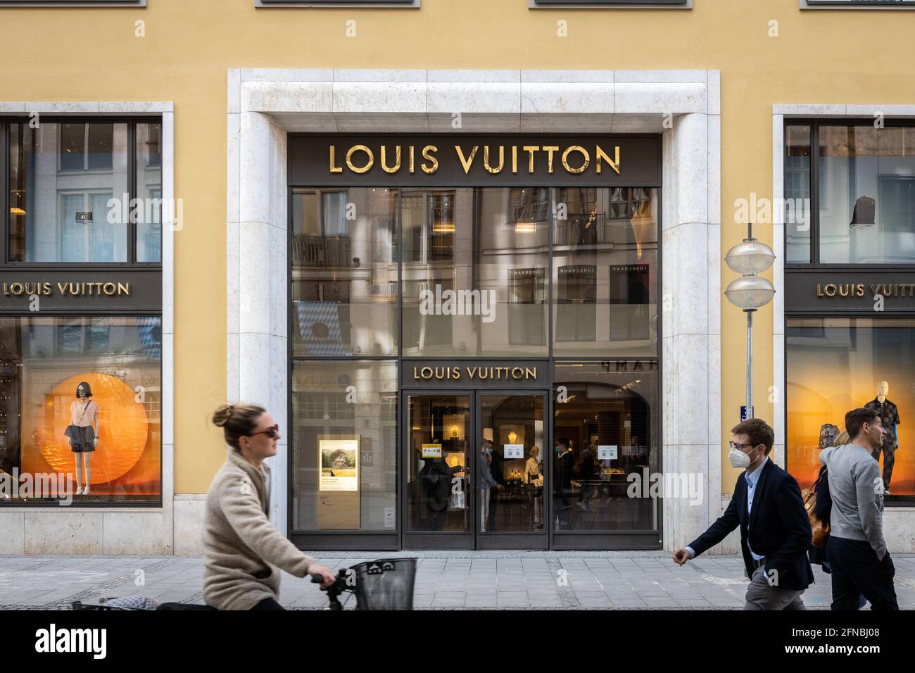 Louis Vuitton store sign in Munich town center Stock Photo