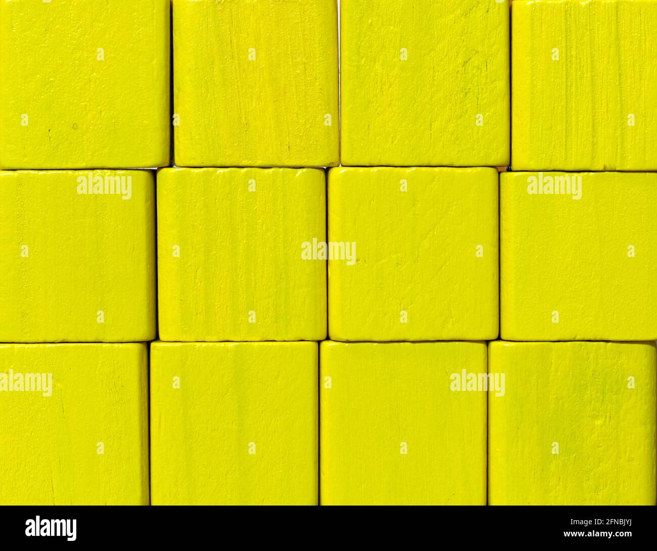 yellow quadratic rough wooden blocks art Stock Photo