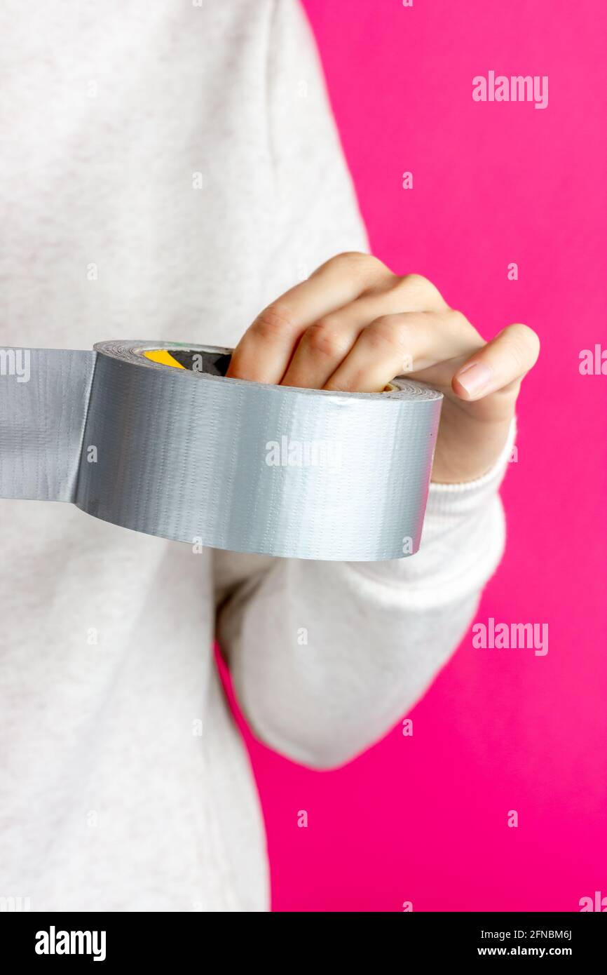 Woman duct tape hold hires stock photography and images Alamy