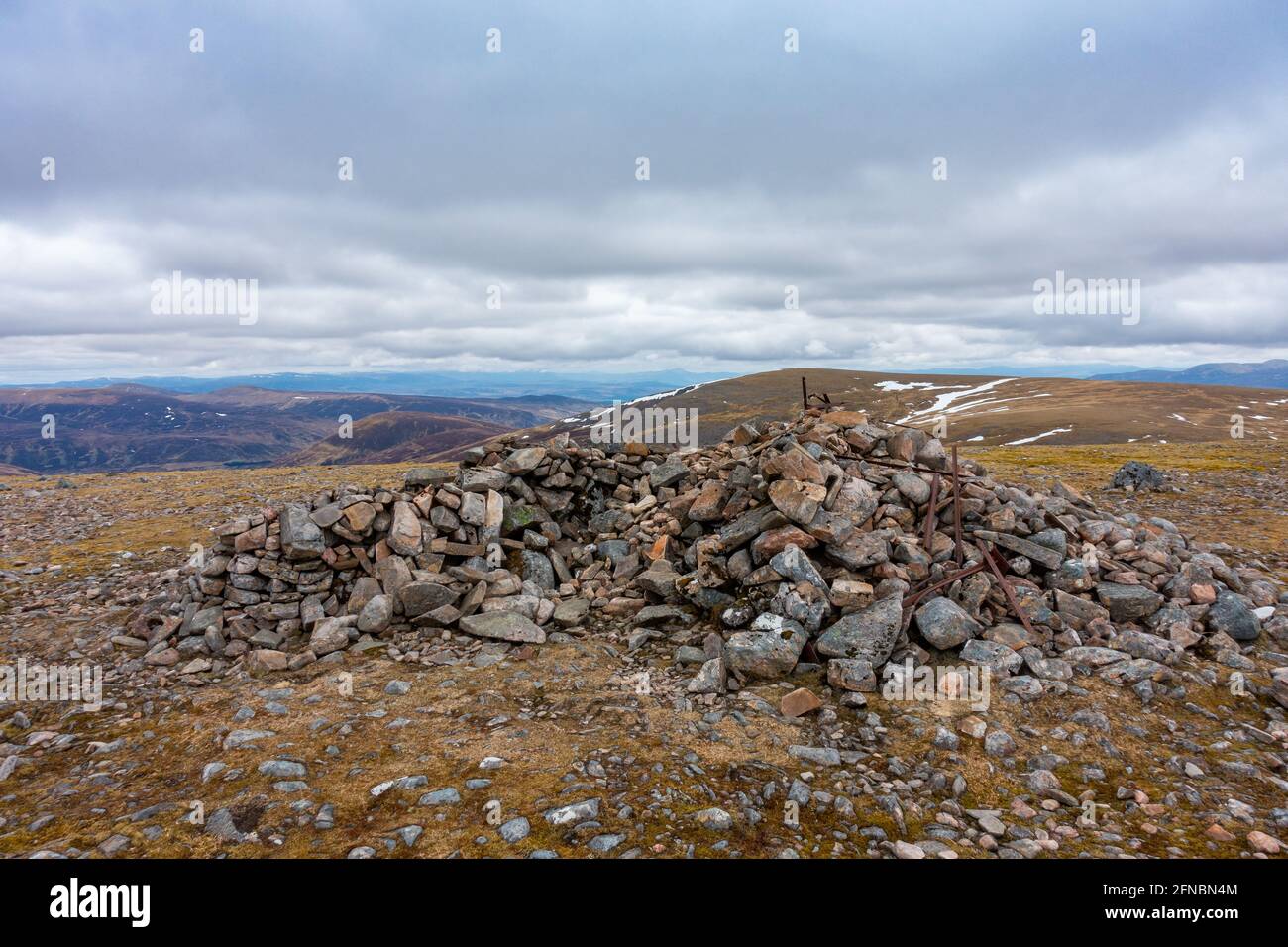 The summit cairn of the Munro mountain of Beinn Udlamain on the west side of the Drumochter Pass, Scotland Stock Photo