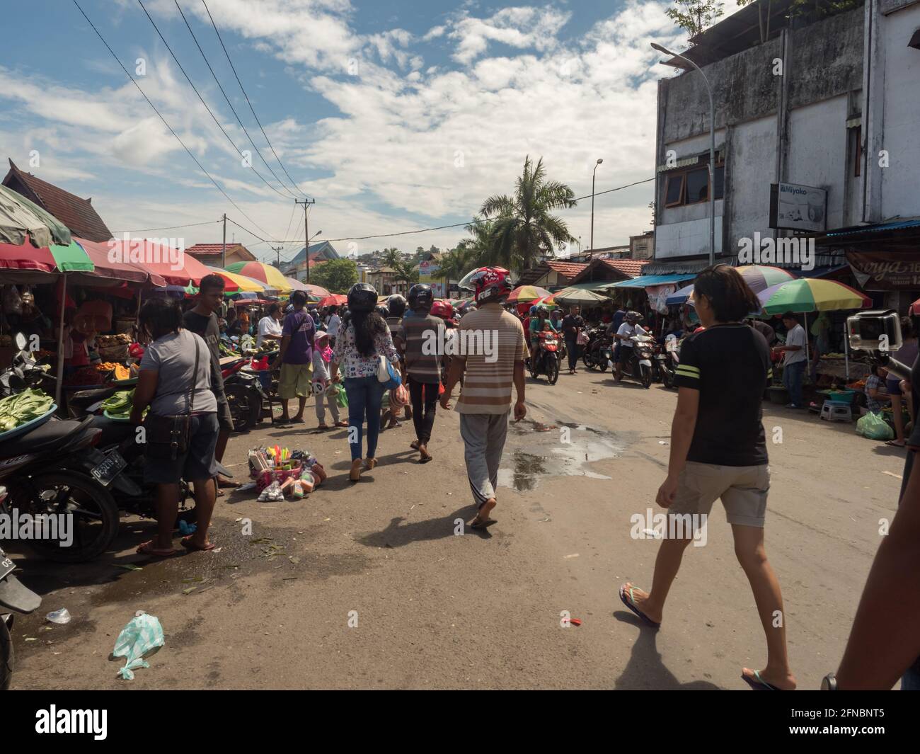 Ambon., Indonesia - Feb, 2018: Crowd of the local people selling and buying different goods on the market, Island of Ambon, Maluku, Indonesia. Asia Stock Photo