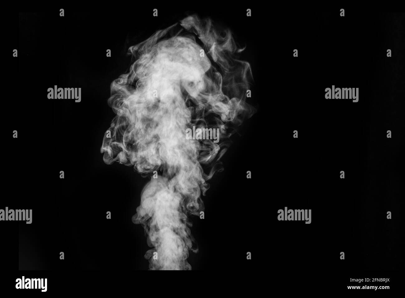 Curly white steam, Fog or smoke isolated transparent special effect on black background. Abstract mist or smog background, design element for your ima Stock Photo