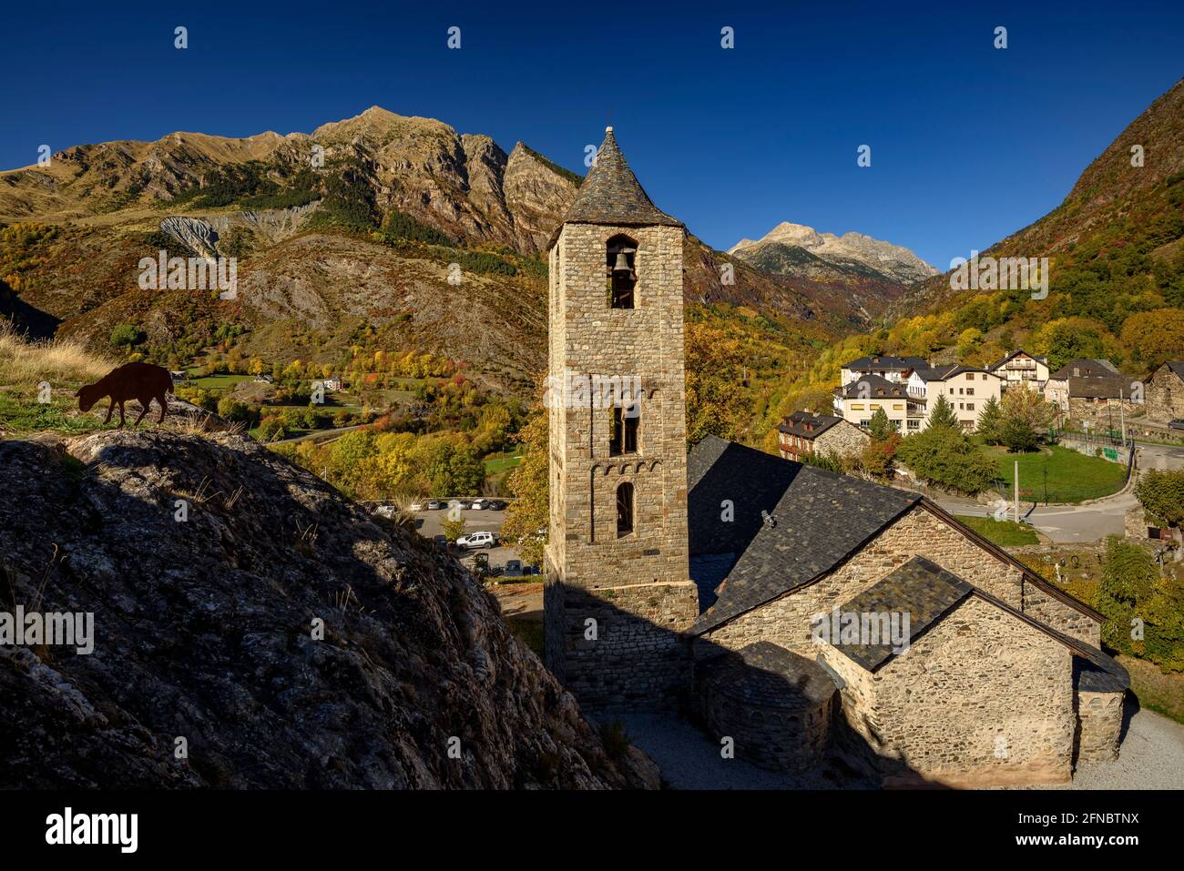 Romanesque church of Sant Joan de Boí in autumn (Vall de Boí, Catalonia, Spain, Pyrenees)  ESP:  Iglesia románica de Sant Joan de Boí en otoño, España Stock Photo