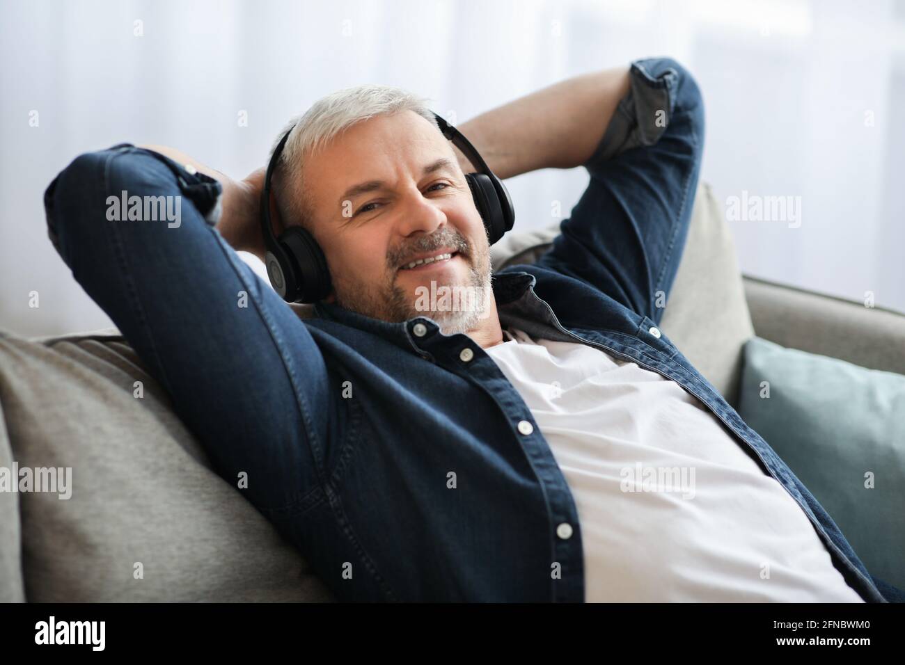 Reclining mature hi-res stock photography and images - Alamy