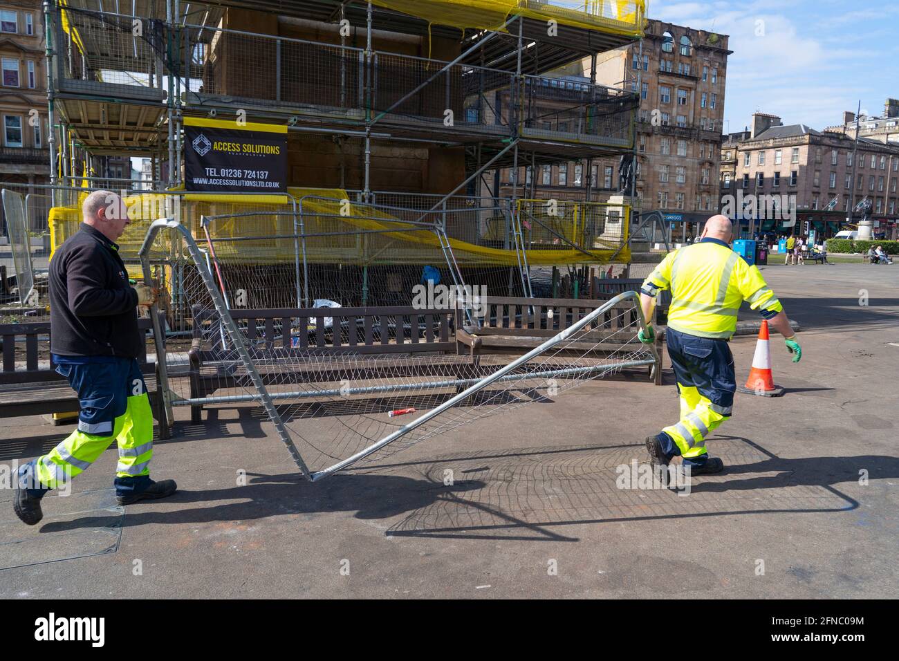 Glasgow, Scotland, UK. 16 May 2021. City cleansing department clearing up damage in George Square after yesterday’s mass celebration by Rangers fans following their Premiership league win. Iain Masterton/Alamy Live News Stock Photo