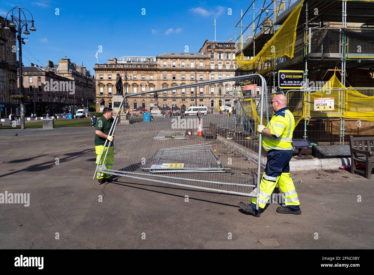 Glasgow, Scotland, UK. 16 May 2021. City cleansing department clearing up damage in George Square after yesterday’s mass celebration by Rangers fans following their Premiership league win. Iain Masterton/Alamy Live News Stock Photo