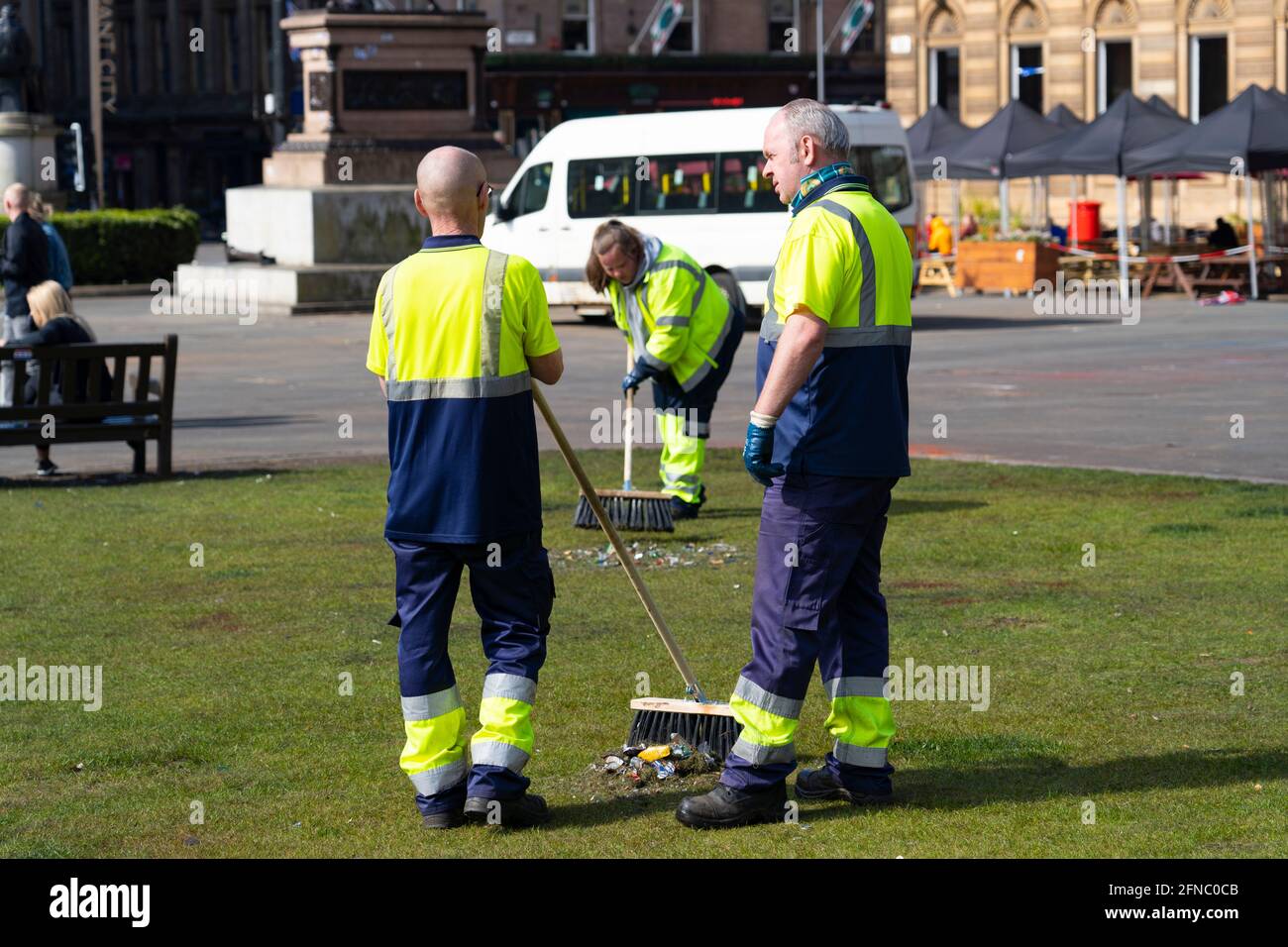 Glasgow, Scotland, UK. 16 May 2021. City cleansing department clearing up damage in George Square after yesterday’s mass celebration by Rangers fans following their Premiership league win. Iain Masterton/Alamy Live News Stock Photo