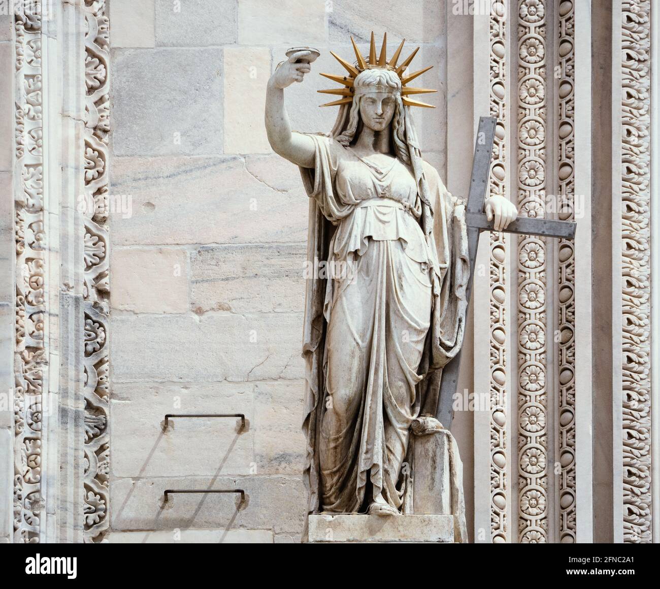 Statue of Camillo Pacetti from 1810 entitled the New Law, on the facade