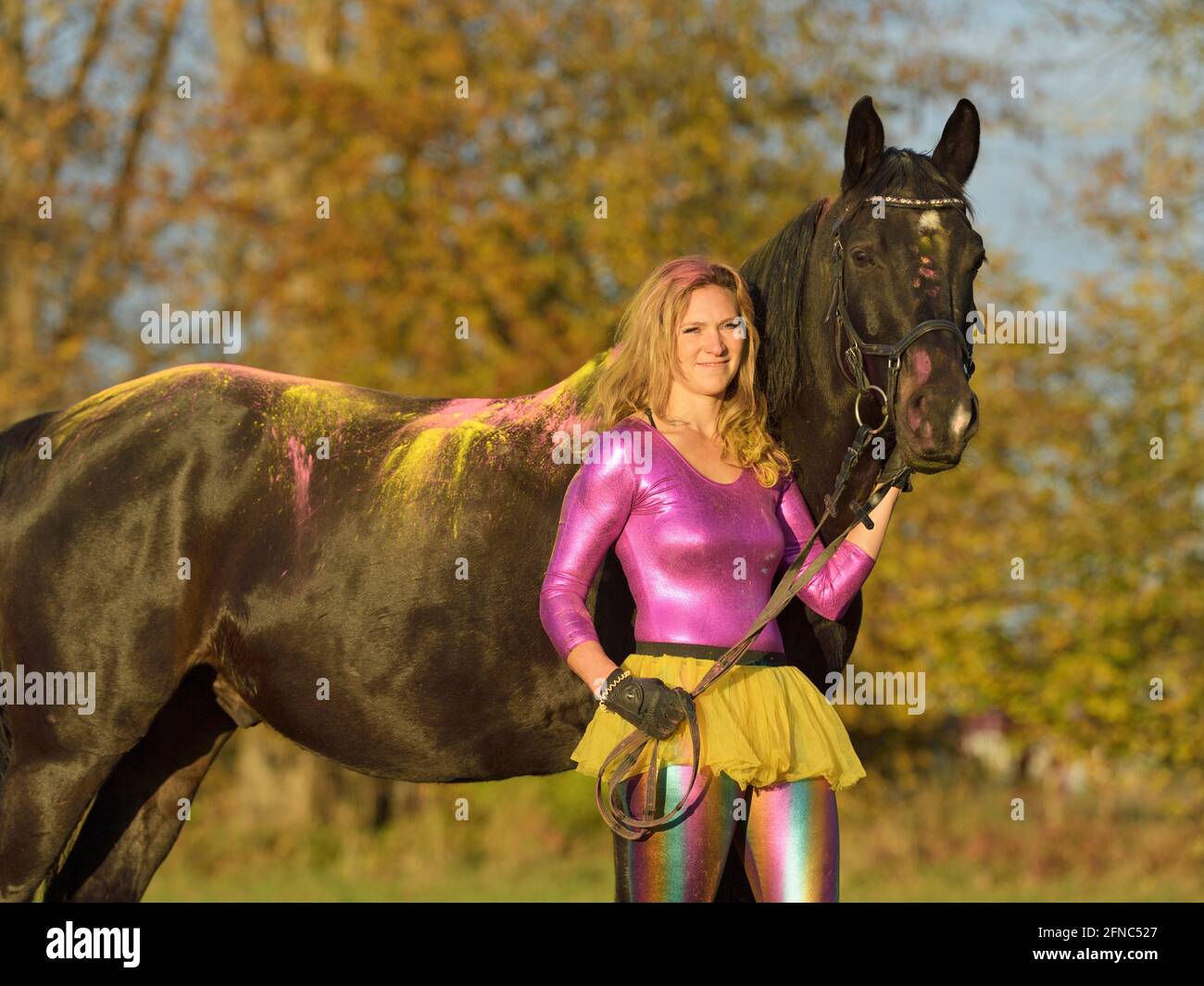 Rider wearing a very special colorful outfit, just for having fun Stock Photo