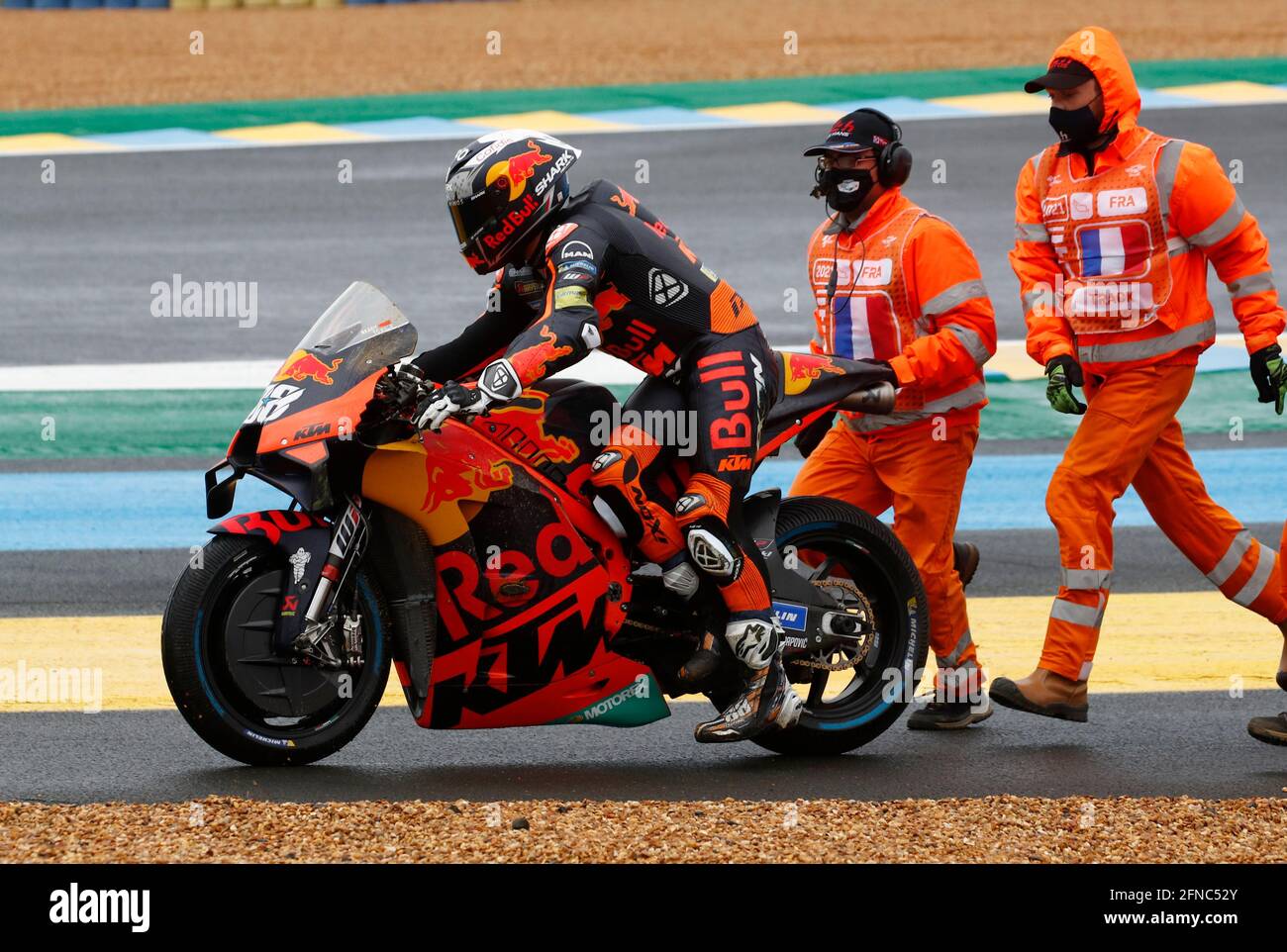MotoGP - French Grand Prix - Circuit Bugatti, Le Mans, France - May 16,  2021 Red Bull KTM Factory Racing's Miguel Oliveira is helped by stewards  during the MotoGP race REUTERS/Stephane Mahe Stock Photo - Alamy