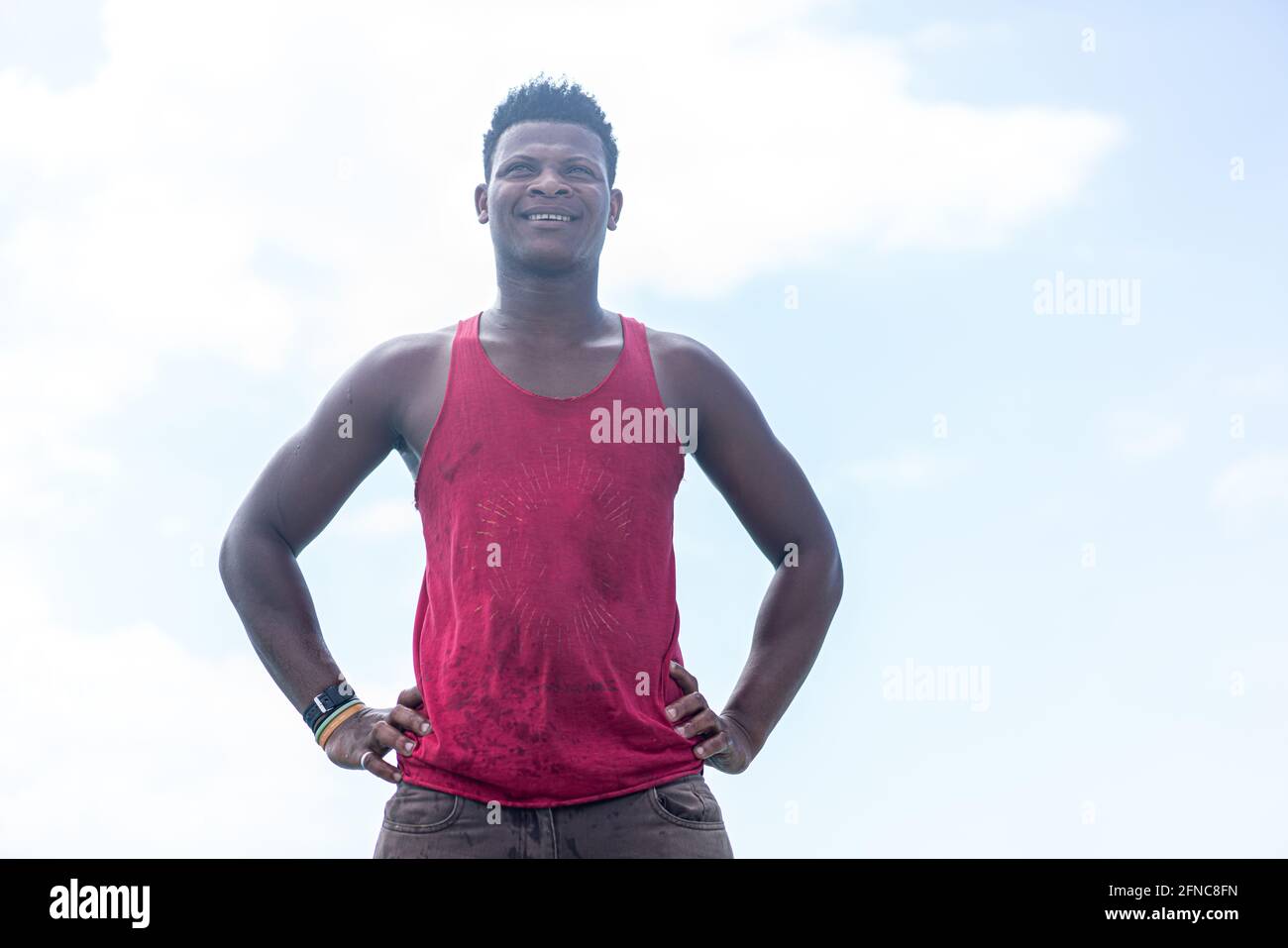 Young black man working on the coast Stock Photo