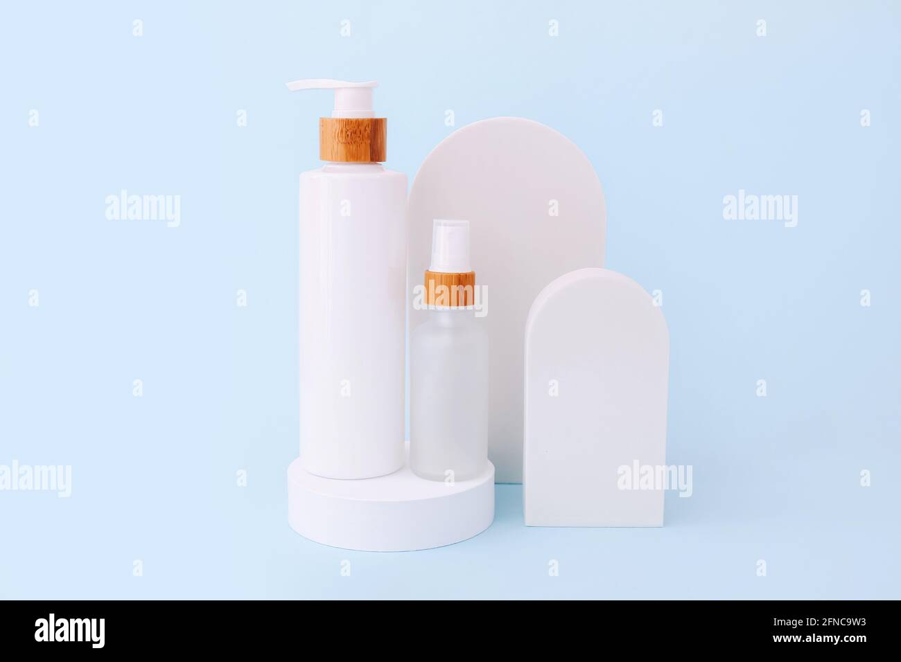 Cosmetic skin care products staying on the geometrical podiums. Product