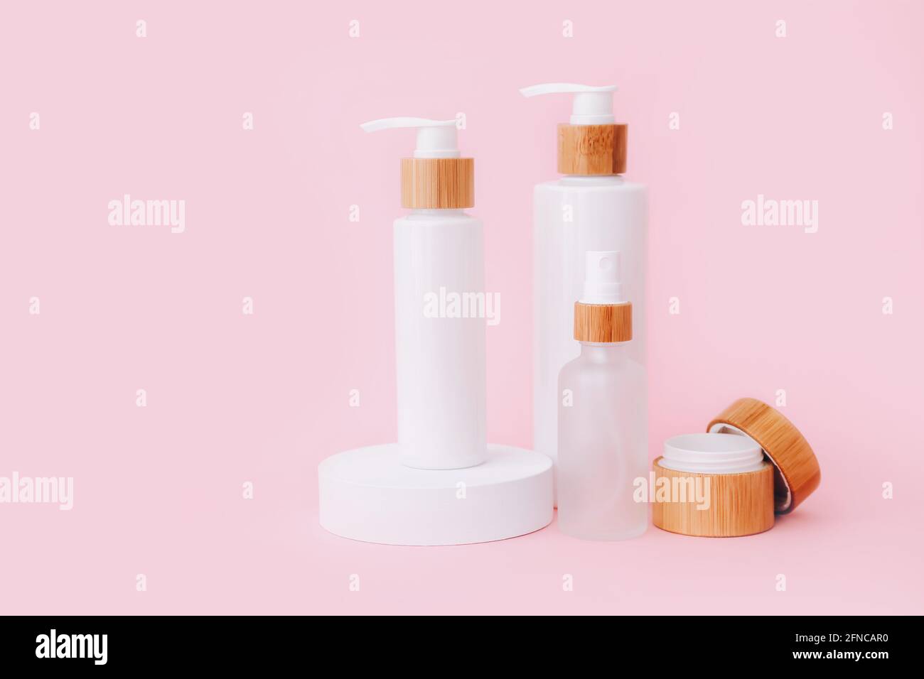 Cosmetic skin care products staying on the geometrical podiums. Product