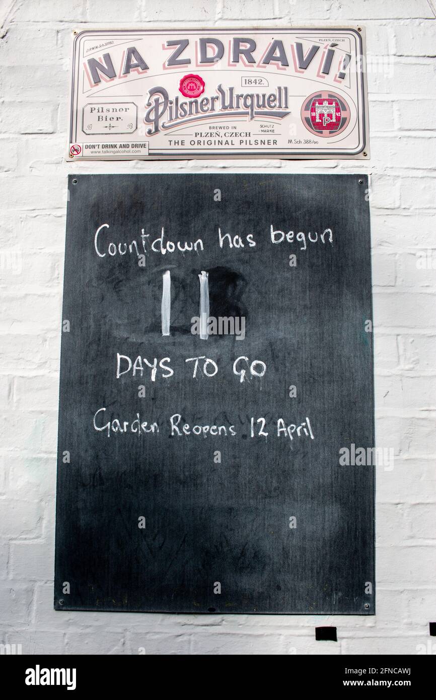 The Cambridge Blue pub has a chalkboard outside showing how many days are left until the Covid-19 restriction that closed pubs are lifted. Stock Photo