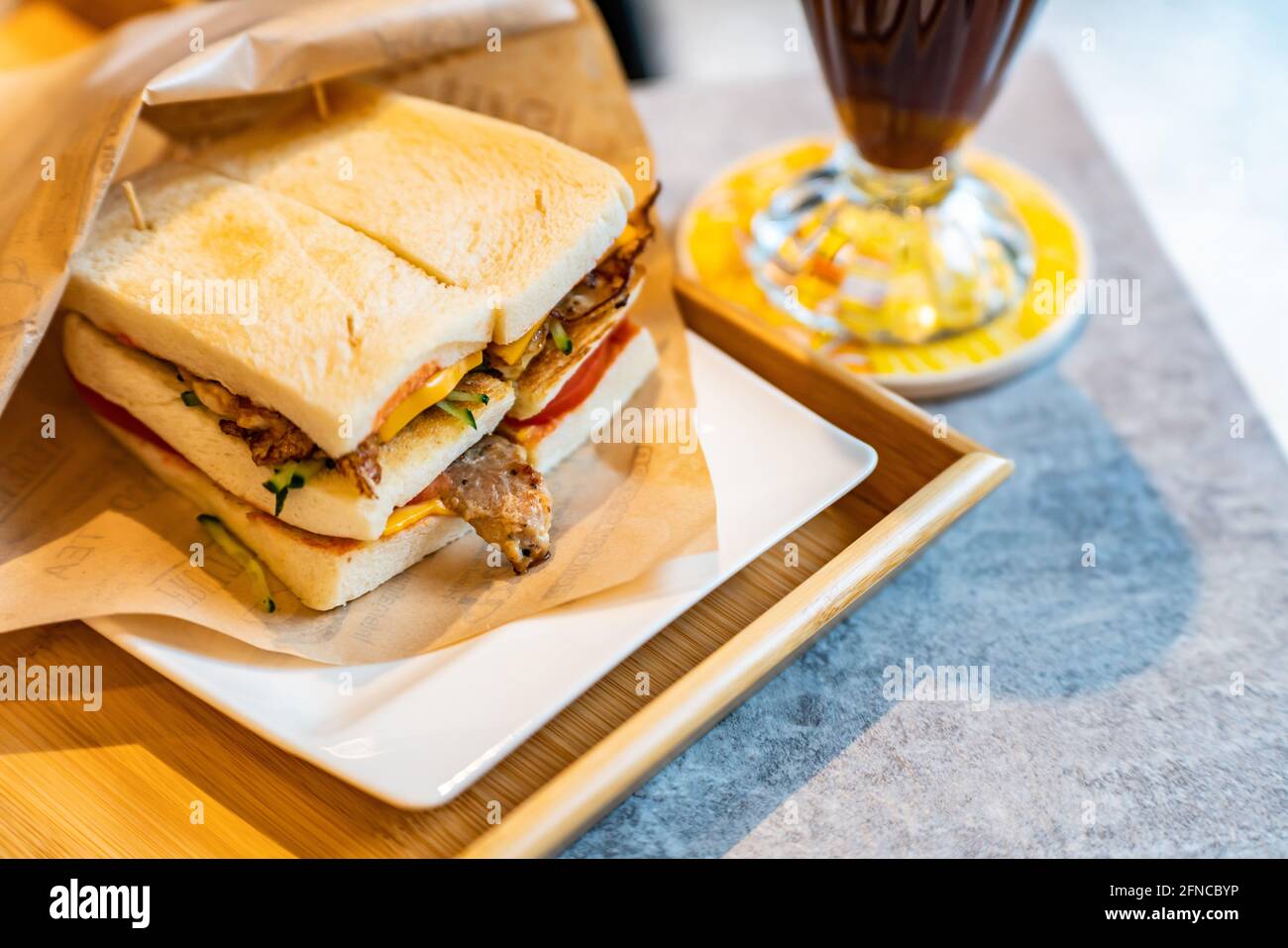 Ice americano, sandwich, tasty smoked beef panino Stock Photo