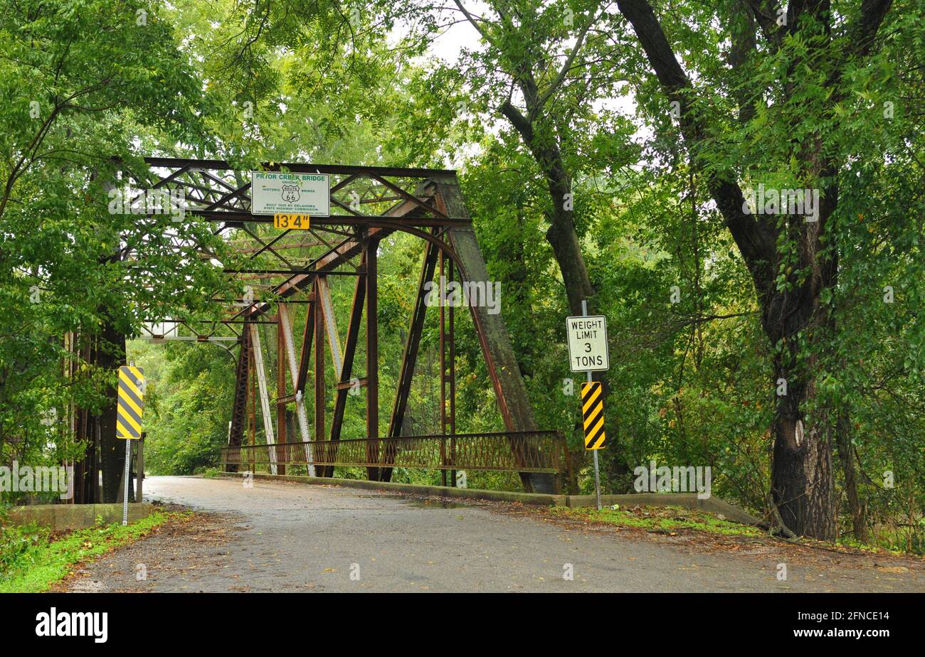 The historic Pryor Creek Bridge, built in 1926 in Chelsea, Oklahoma, carried Route 66 over the creek until 1932, when Route 66 was realigned. Stock Photo