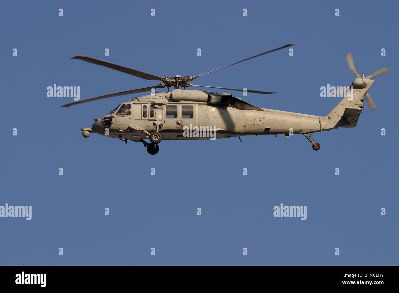 A Sikorsky SH-60 Seahawk helicopter with the US Navy Amphibious Assault Carrier, USS America  (LHA-6) seen flying in Kanagawa. (Photo by Damon Coulter / SOPA Images/Sipa USA) Stock Photo