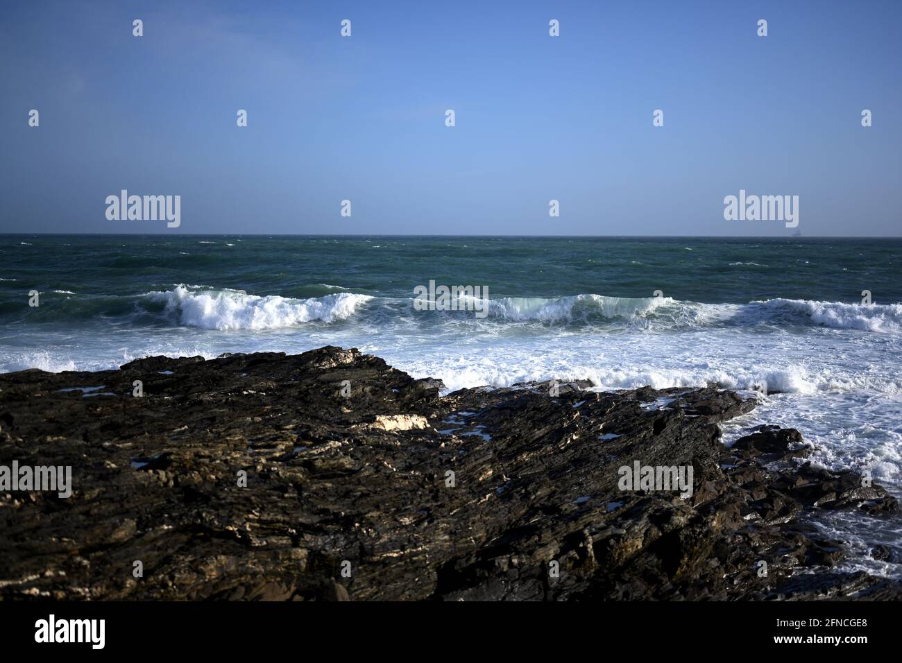 Beautiful seascape with rocky coastline and waves crashing onto the rocks, rocky and rugged coastline concept Stock Photo